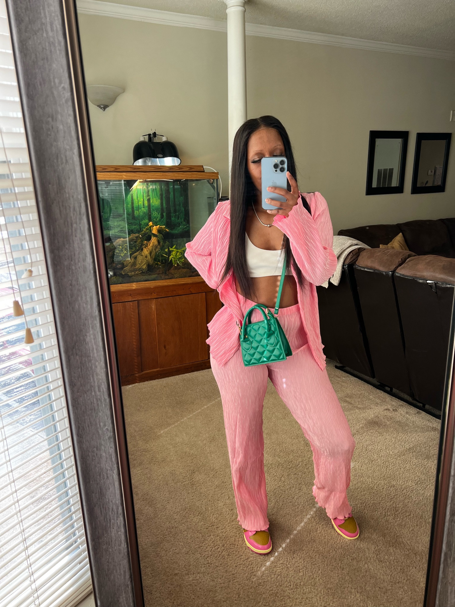 Solo date outfit ideas. I’m wearing a pink matching set with a white crop top, green purse, and Nike dunk low sneakers

#LTKOver40 #LTKShoeCrush #LTKStyleTip