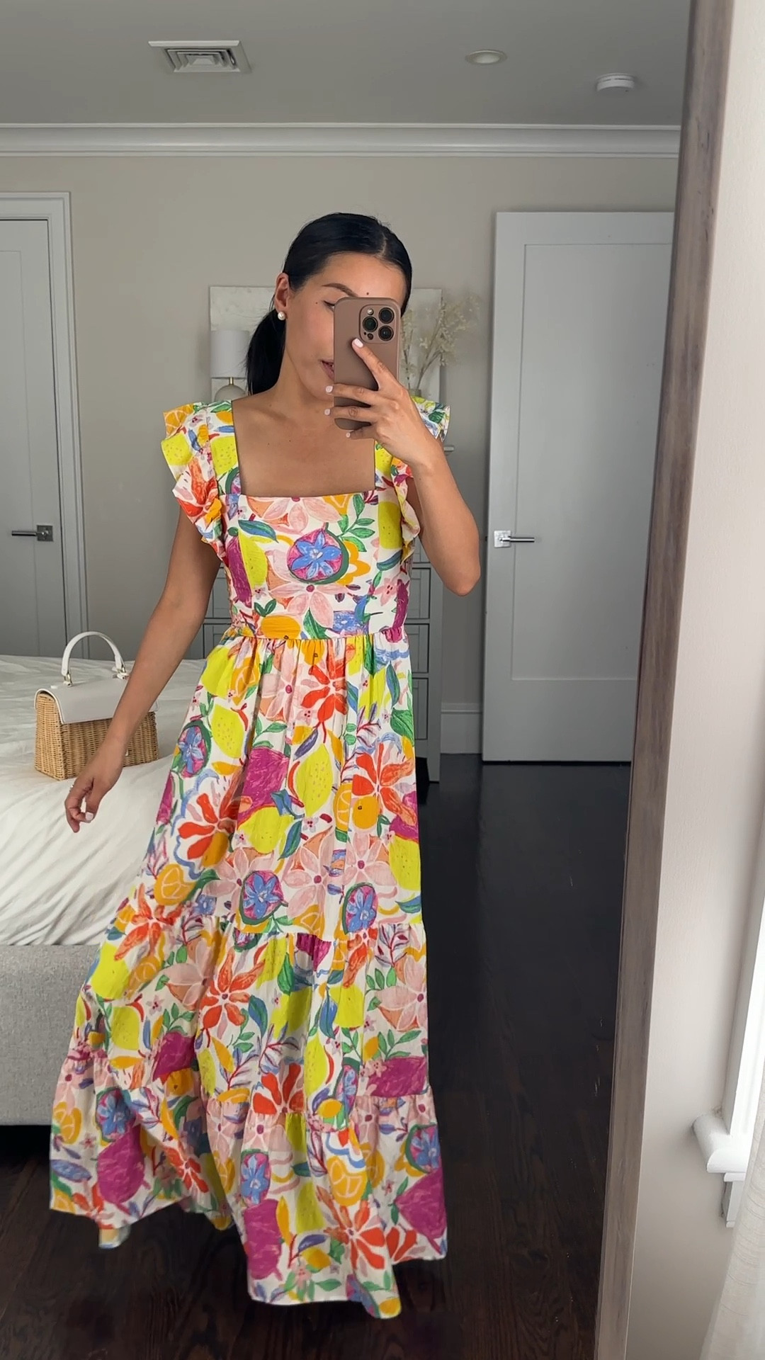 Sale alert on this dress-

Trying on this Aqua dress in XS. The fabric is so flowy and light as air! I’m usually an xxs so the fit is a little big on me at the neckline with some gapping - the tie back style helps with the fit since I can tie it more snugly, but this would fit ideally on someone who is a true XS. Colorful lemon citrus and floral print is so pretty for summer events or a wedding . 

• Sam Edelman Waylon slides 5.5 
• Modern picnic mini wicker bag 

#petite friendly summer outfits#LTKWedding #LTKParties

#LTKVideo