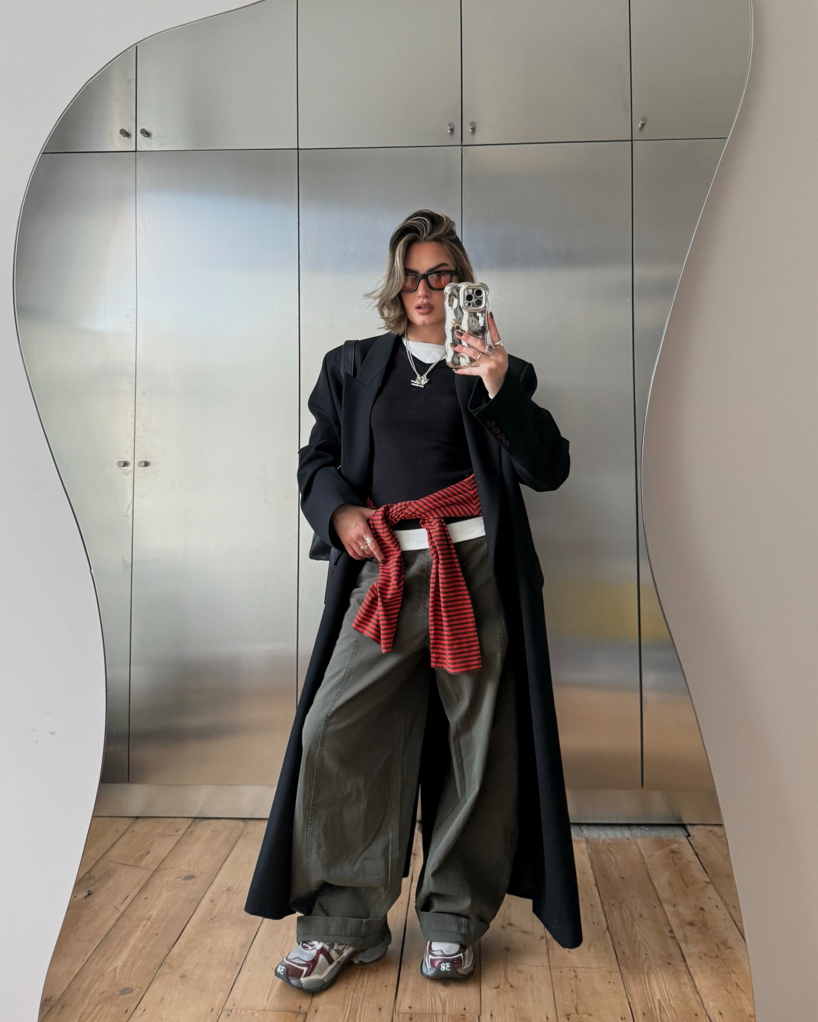 Layered top, black tailored coat, khaki trousers, barrel leg, stripe tshirt 

#LTKuk #LTKwinter #LTKspring