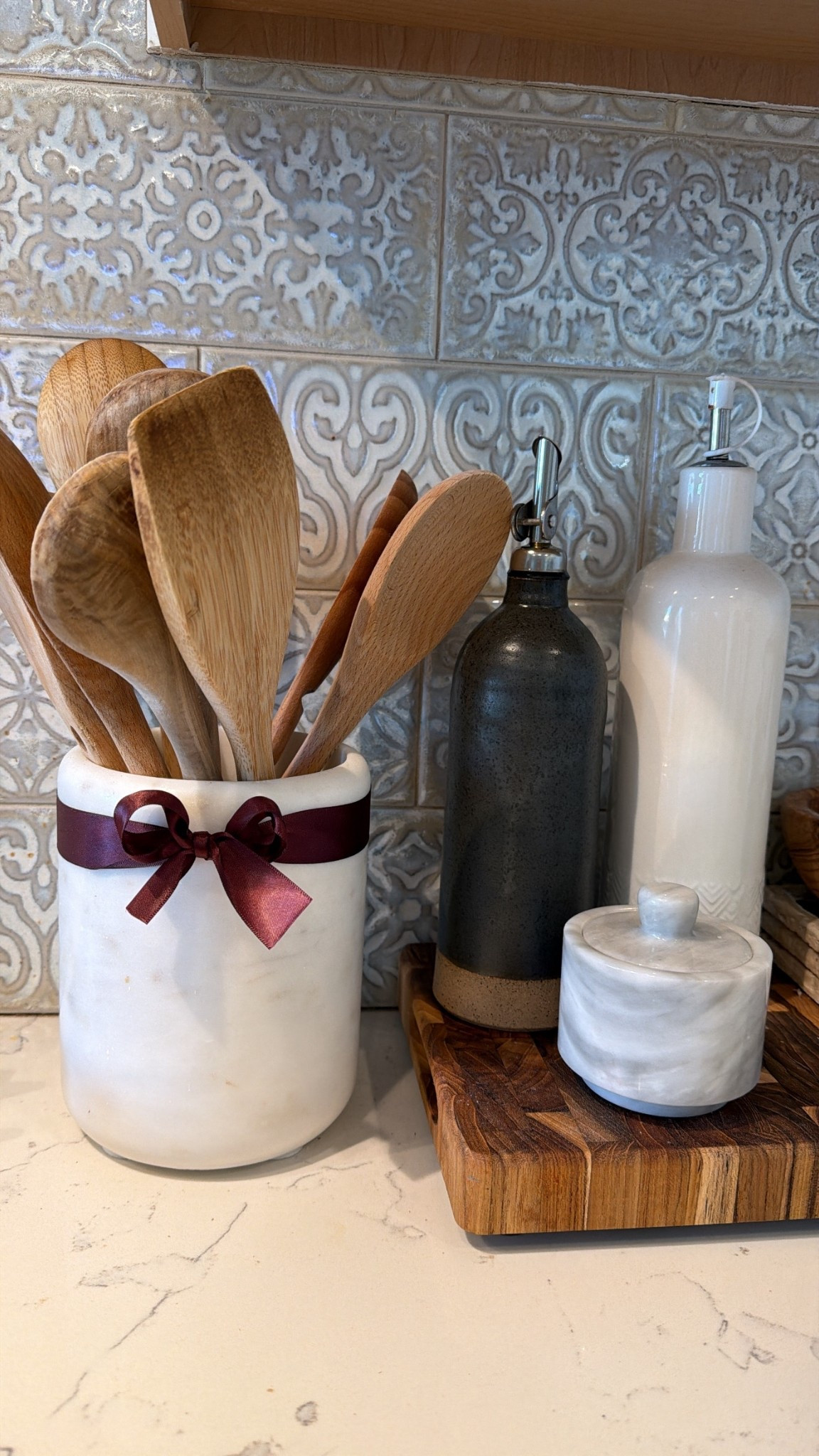 The cutest way to add a touch of Christmas decor to the kitchen! Tie a little bow around the utensil holder ❤️ you can use any ribbon! 

#LTKSeasonal #LTKHome #LTKHoliday