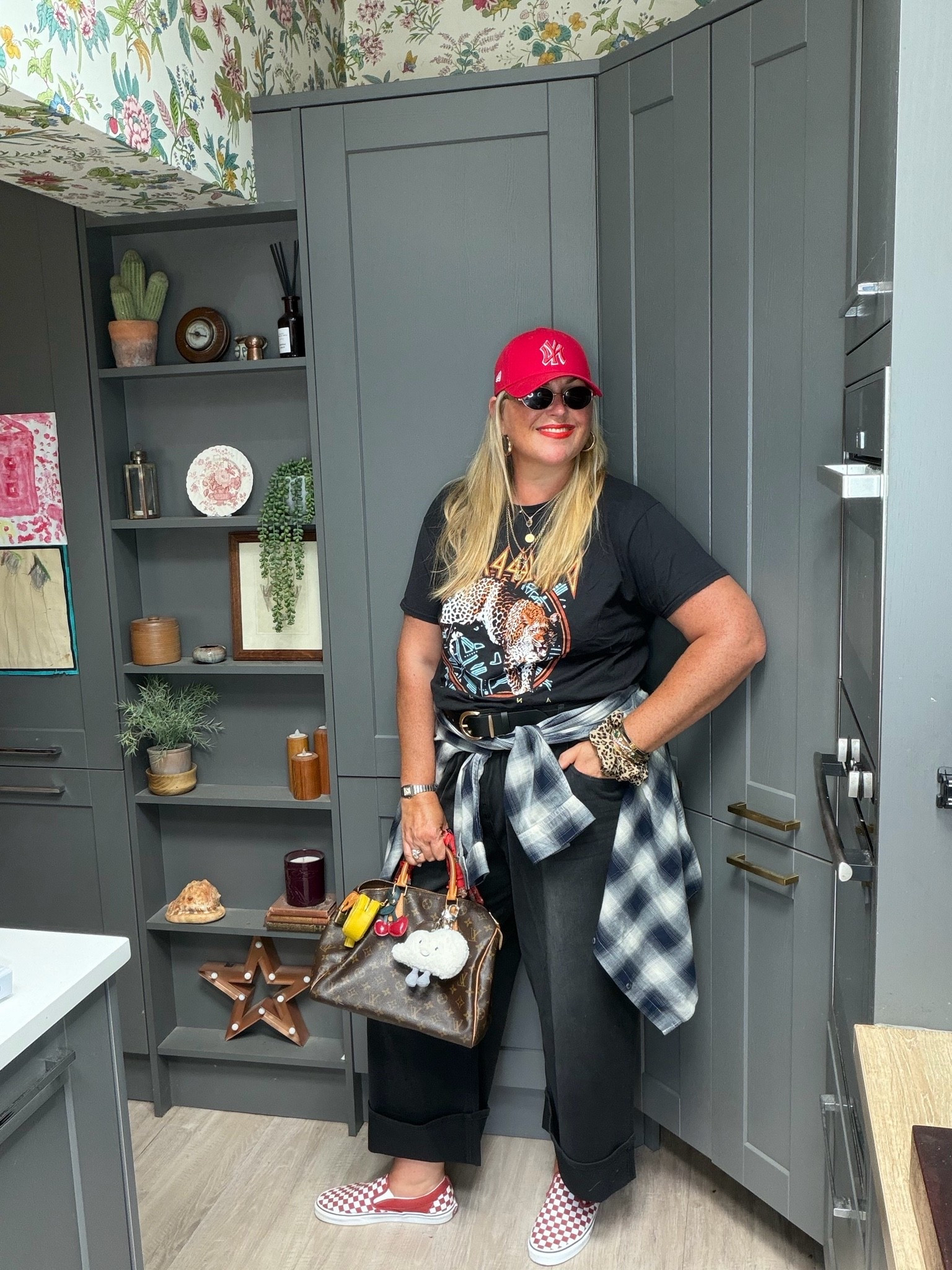 Red cap, band tshirt, check shirt, black jeans, checkerboard vans, brown bag

#LTKjeans #LTKautumn #LTKplussize