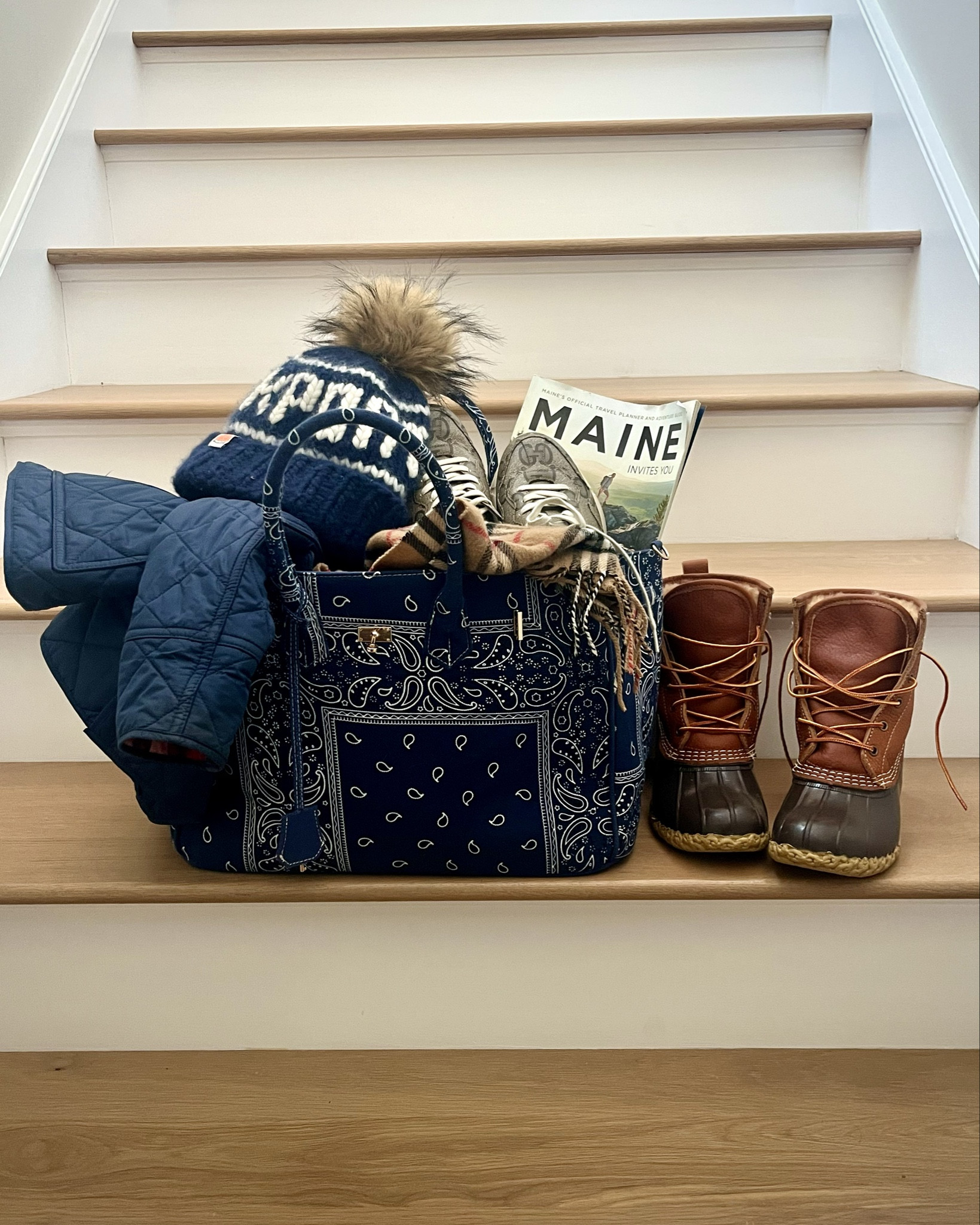 Several questions about this great bag seen in my Maine roundup post. Loving this versatile bag! Chic and structured to be a beautiful every day bag, but big enough for a laptop or small carryon. It works as a small overnight bag too. The blue bandana pattern can transition to cooler weather too. A great gift. Comes with crocheted strawberry tag - swipe to see more views. Other color combos plus a smaller size to coordinate. Use code PHAEDRA20 to save 20% off too! 

#LTKGiftGuide #LTKootd #LTKHoliday