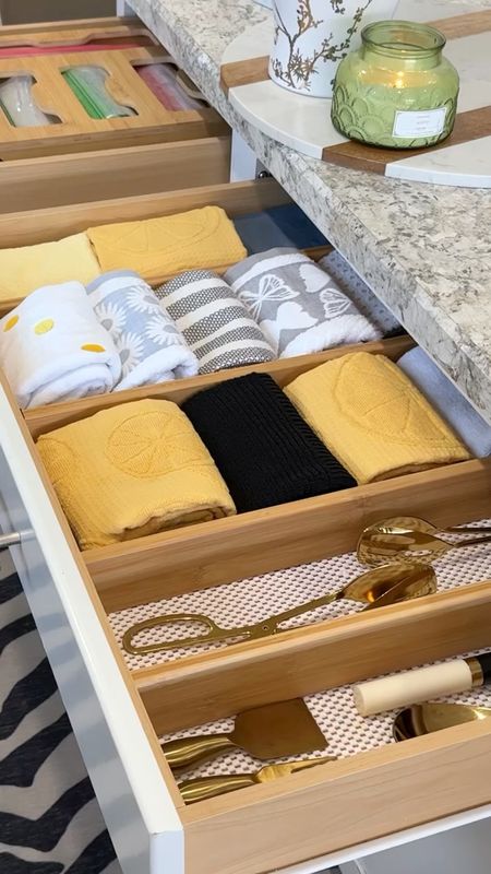 These bamboo dividers help keep my kitchen towels and utensils neat & organized. 

The ziploc bag organizer has simplified my life & made me a happier mama I swear. My kids can pack their snacks easier without asking me where everything is 🙌🏽💃🏻 I’m winning in life 😀 shop both organizers below. 

Organizers kitchen drawer organizers 

#LTKsalealert #LTKhome #LTKfindsunder50