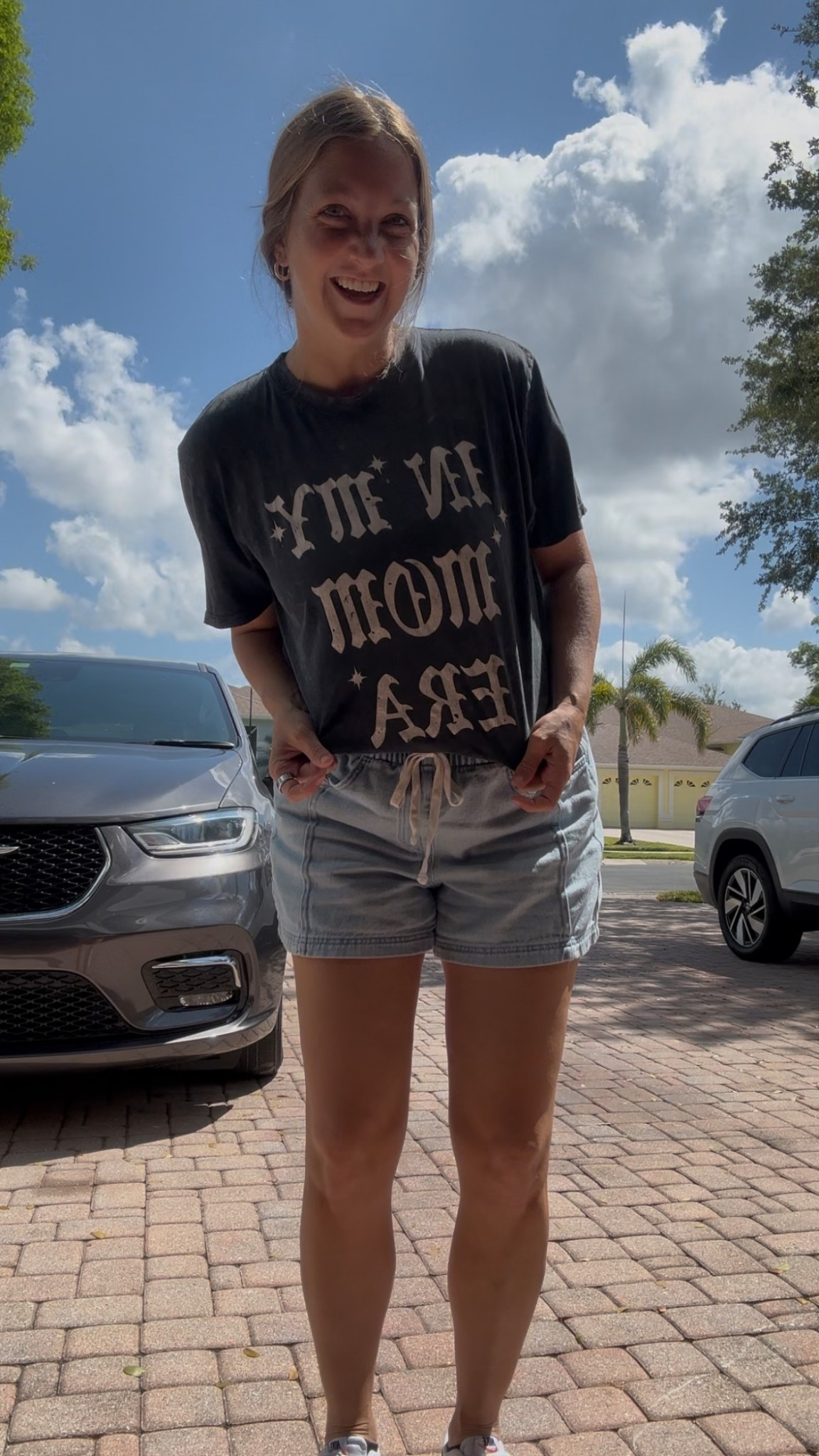 My favorite Karrie Locher shirt + these comfy, drawstring loose fitting shorts and sneakers are the perfect errand running outfit or to chase toddlers around  

#LTKFindsUnder50