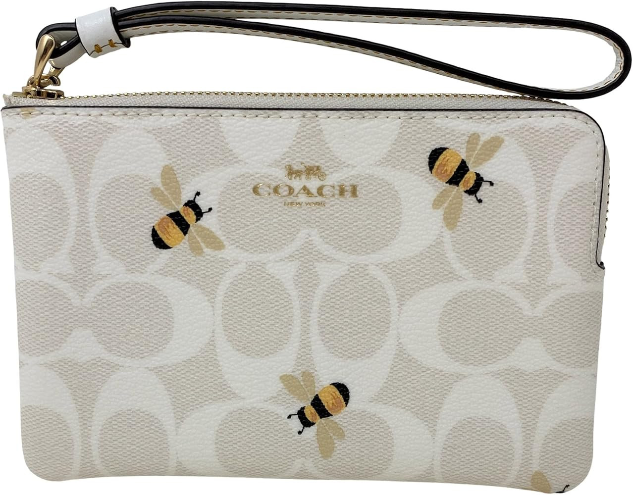 COACH Women's Corner Zip Wristlet in Signature Canvas | Amazon (US)
