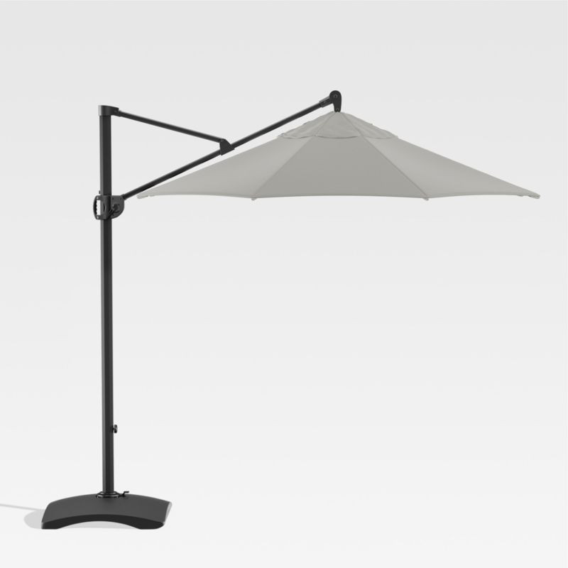 10' Sunbrella Graphite Round Cantilever Outdoor Patio Umbrella with Base | Crate & Barrel | Crate & Barrel