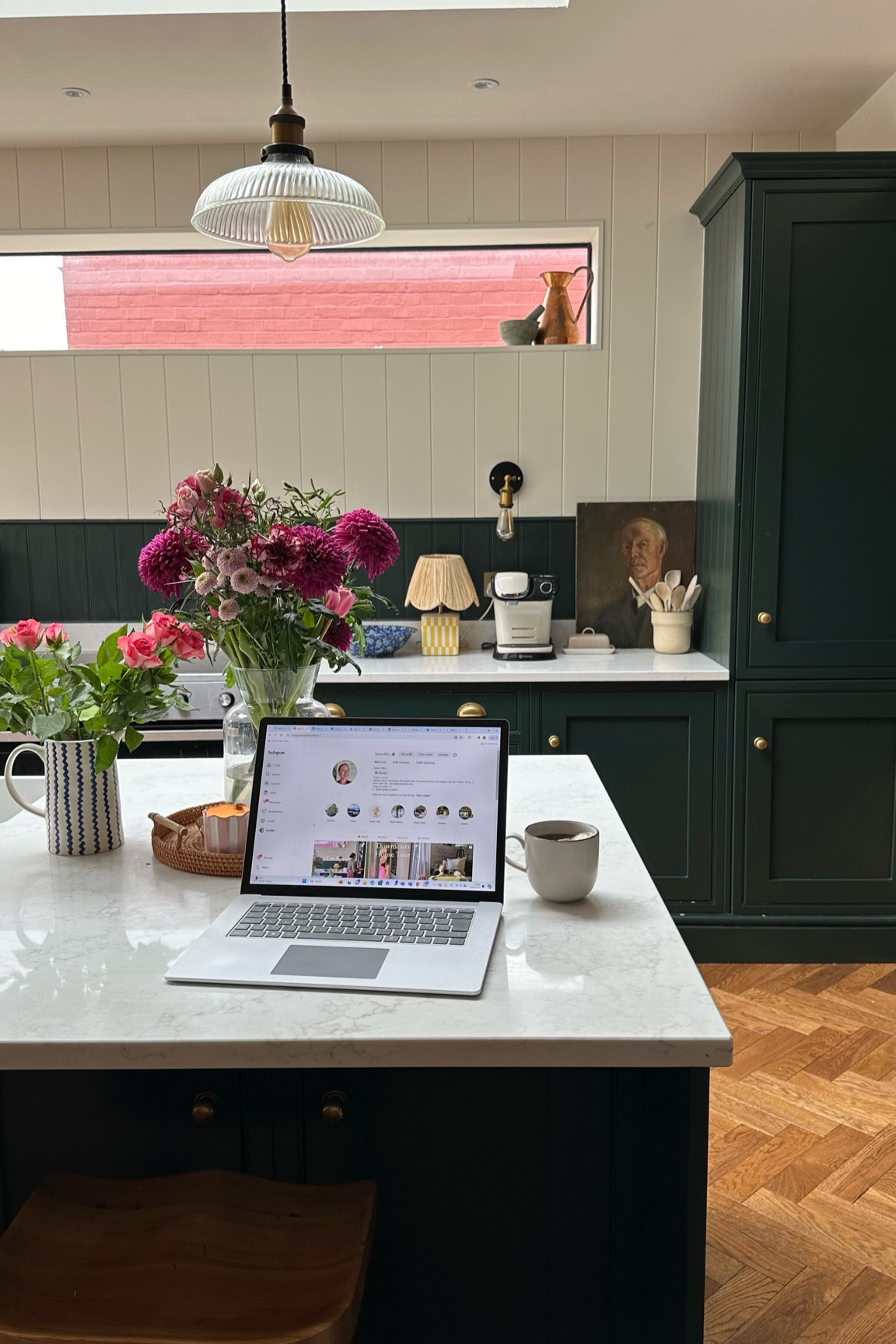 Green shaker inframe traditional kitchen with scallop lamp, simple bar stools, vases, coffee machine, wall lights, pendant light and antique art. 

#LTKeurope #LTKhome #LTKover40