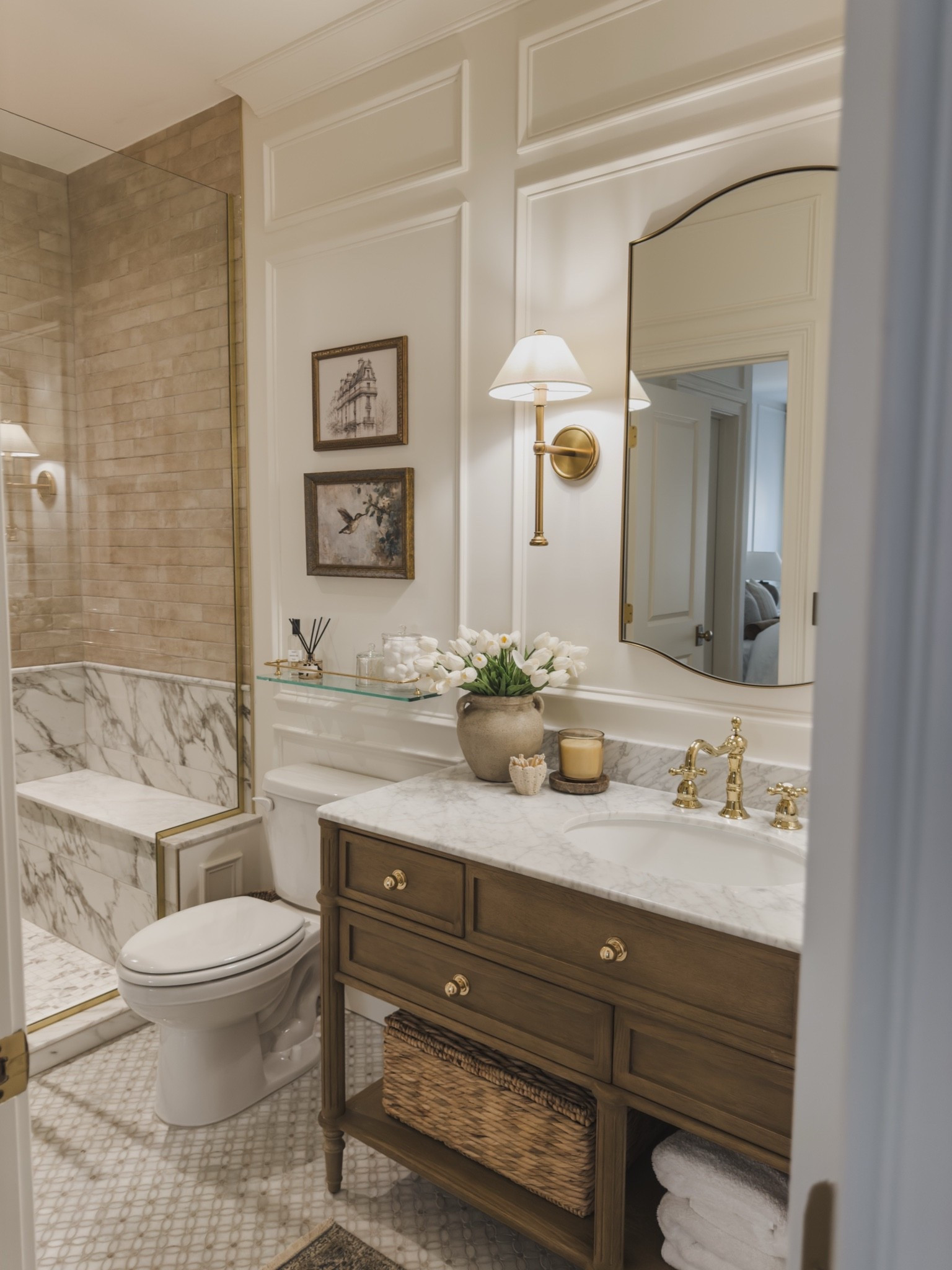 Timeless, warm, and chic guest bathroom vibes! From statement tile detail to brass accents and neutral wood tones — this is one of my favorite DIY projects to date and so in love with the transformation of this space. 

Home finds, neutral home inspo, collected style, guest bathroom refresh, neutral wood tones, wainscoting detail, statement lighting, brass hardware, quality over quality, faux florals, shelving details, brass faucet, Wayfair, Rejuvenation, Etsy, Anthropologie, shop the look!

#LTKSeasonal #LTKHome