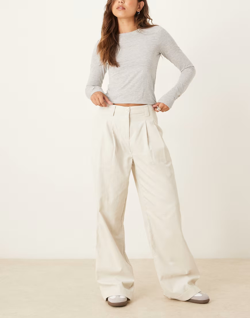 ASOS DESIGN cuffed hem wide leg corduroy pants in cream-White | ASOS (Global)