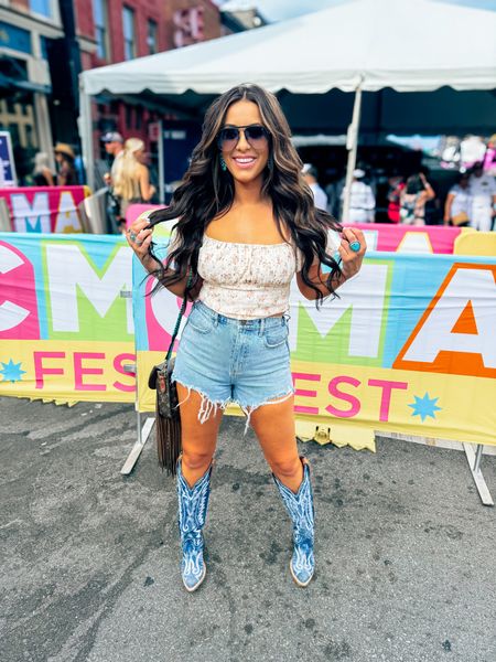 Nashville outfit idea, altered State floral corset top blue jeans, shorts wearing both true to size medium in the top denim cowgirl boots from Dan, post fringe cowgirl, Trendy bag, sunglasses, rodeo Fashion country music concert outfit idea, music festival, outfit ideas summer spring
Floral 

#LTKWorkwear #LTKFindsUnder50 #LTKStyleTip