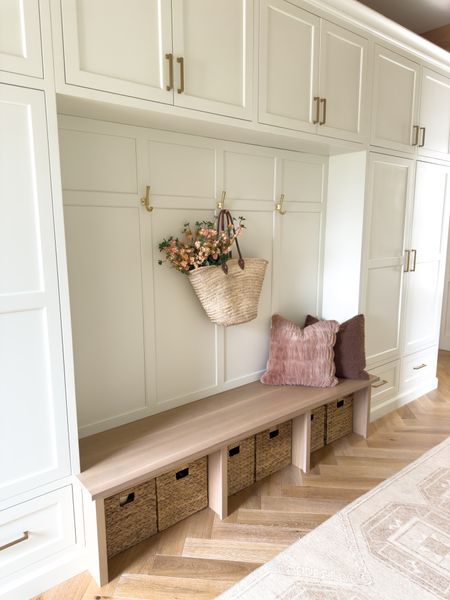 Spring mudroom decor details. This space is highly utilized and baskets underneath the bench helps to organize and hide every day items 

Spring home, spring refresh, mudroom details, basket, organization details, gold hardware, light and bright, neutral wood tones, pops of pink, throw pillow, neutral home, aesthetic decor, neutral rug runner, Pottery Barn style, found it on Amazon, shop the look!

#LTKhome #LTKstyletip 

#LTKSeasonal