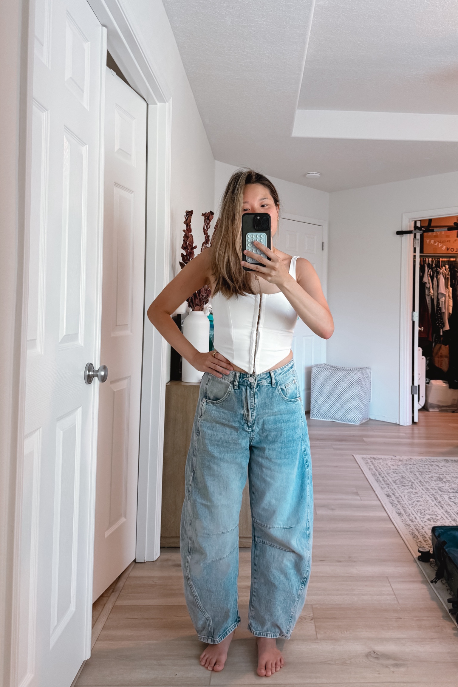 A similar look to FP barrel jeans but more relaxed. I like that it looks less bowed but still holds structure to give me more shape! Corset top is so comfy and has flexibility and not tight. 

Jeans size: 4 top: small

#LTKStyleTip