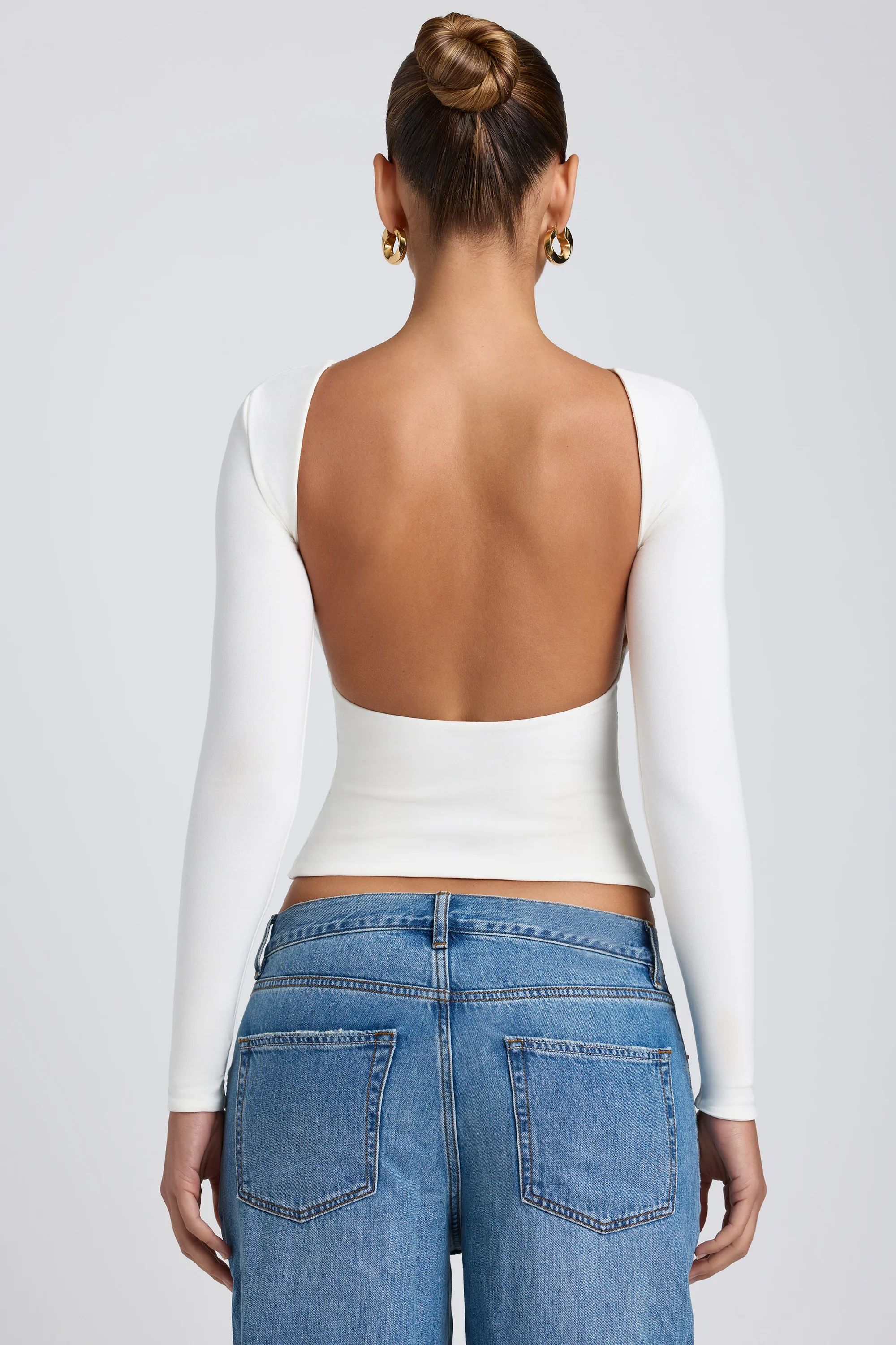 Modal High Neck Long Sleeve Open Back Top in White | Oh Polly