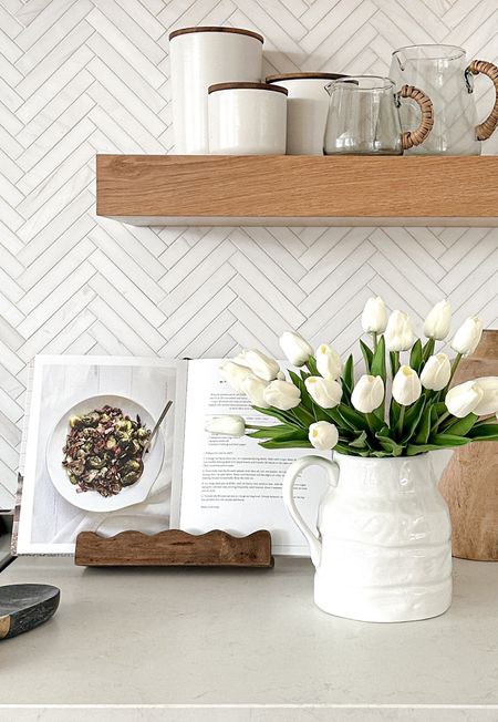 I ordered this sweet little scalloped cookbook stand and it’s the perfect action to our kitchen countertop.  (I’ll link the tulips as well because they are beautiful!)

#LTKfindsunder100 #LTKhome #LTKfindsunder50