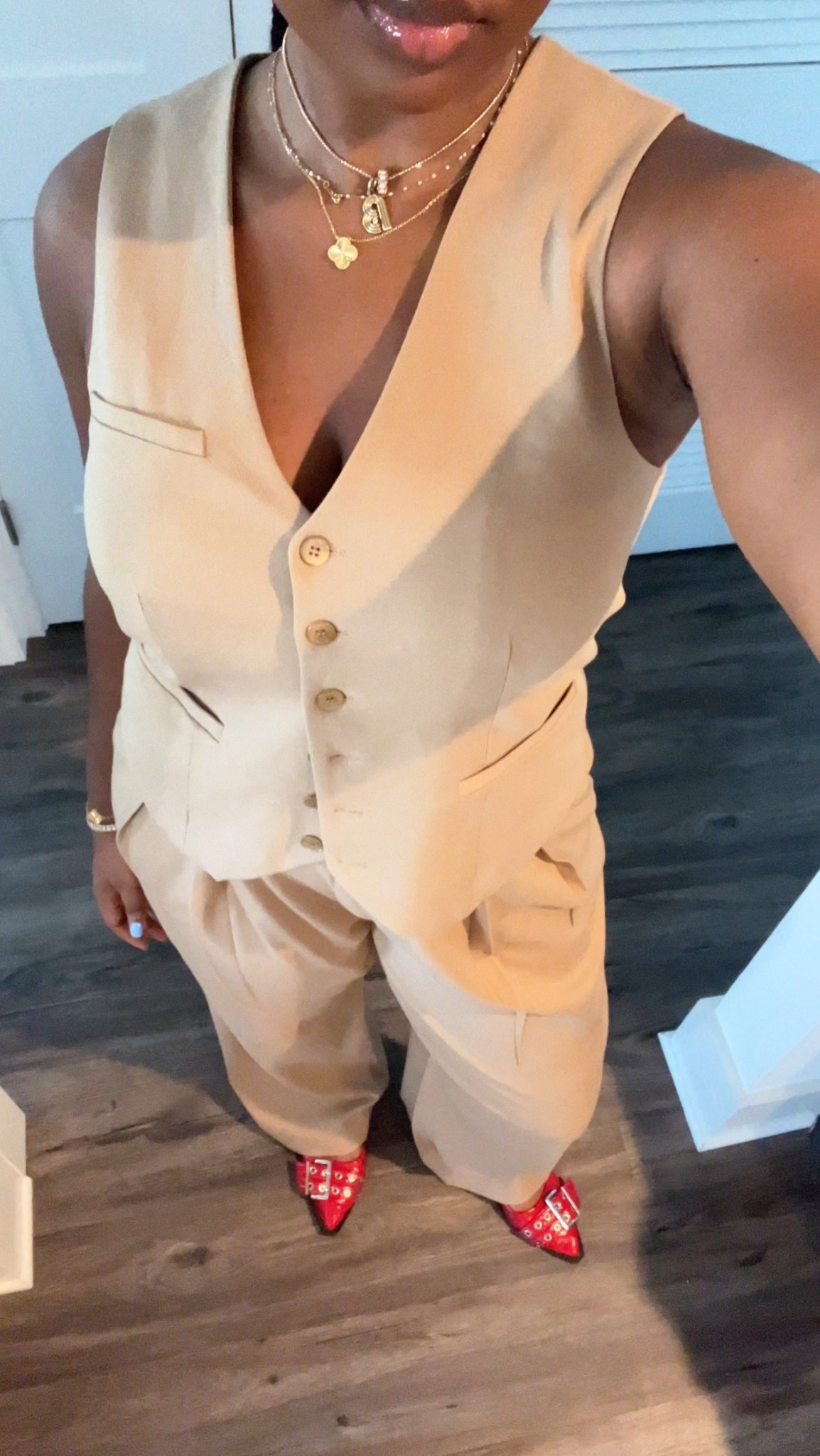 clean classy corporate outfit: tan staud set + red shoes + gold jewelry 

#LTKSeasonal #LTKWorkwear #LTKStyleTip