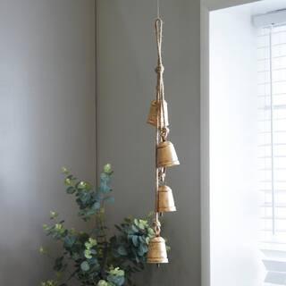 Gold Metal Tibetan Inspired Cylindrical Decorative Bell with Jute Hanging Rope | The Home Depot