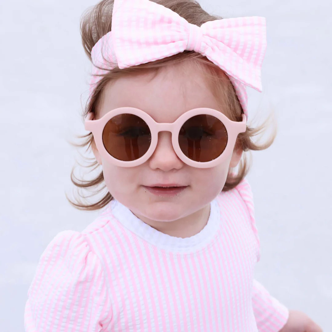 Long Sleeve Rash Guard With Ruffle Bottom | Seersucker Pink | Caden Lane