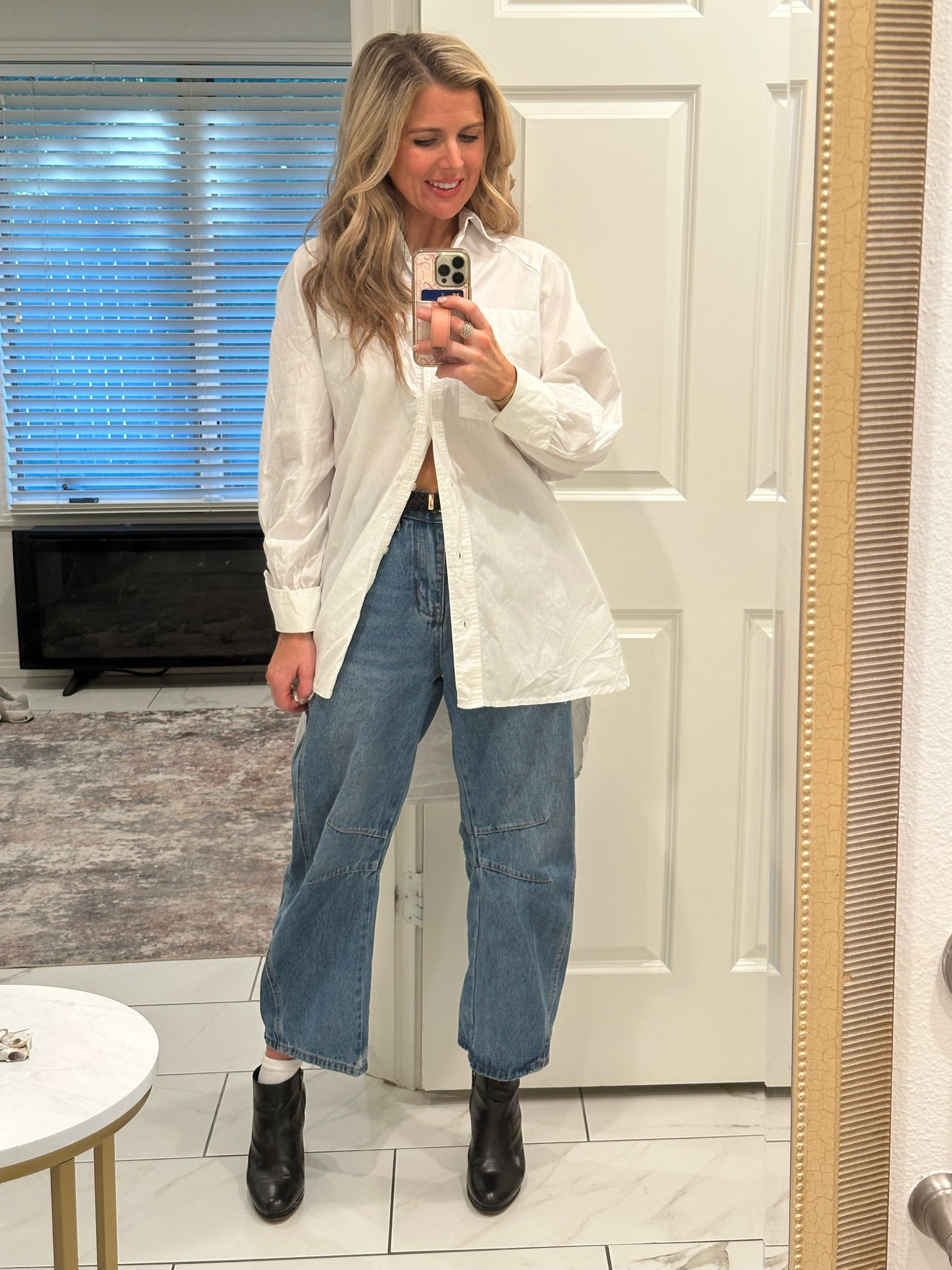 I paired these barrel jeans with an oversized button down, halfway buttoned and some booties and kind of loved the vibe! Plus, if you only wear them a couple of seasons, it’s easier to stomach the cost when they’re this cheap!

#LTKFindsUnder100 #LTKFindsUnder50