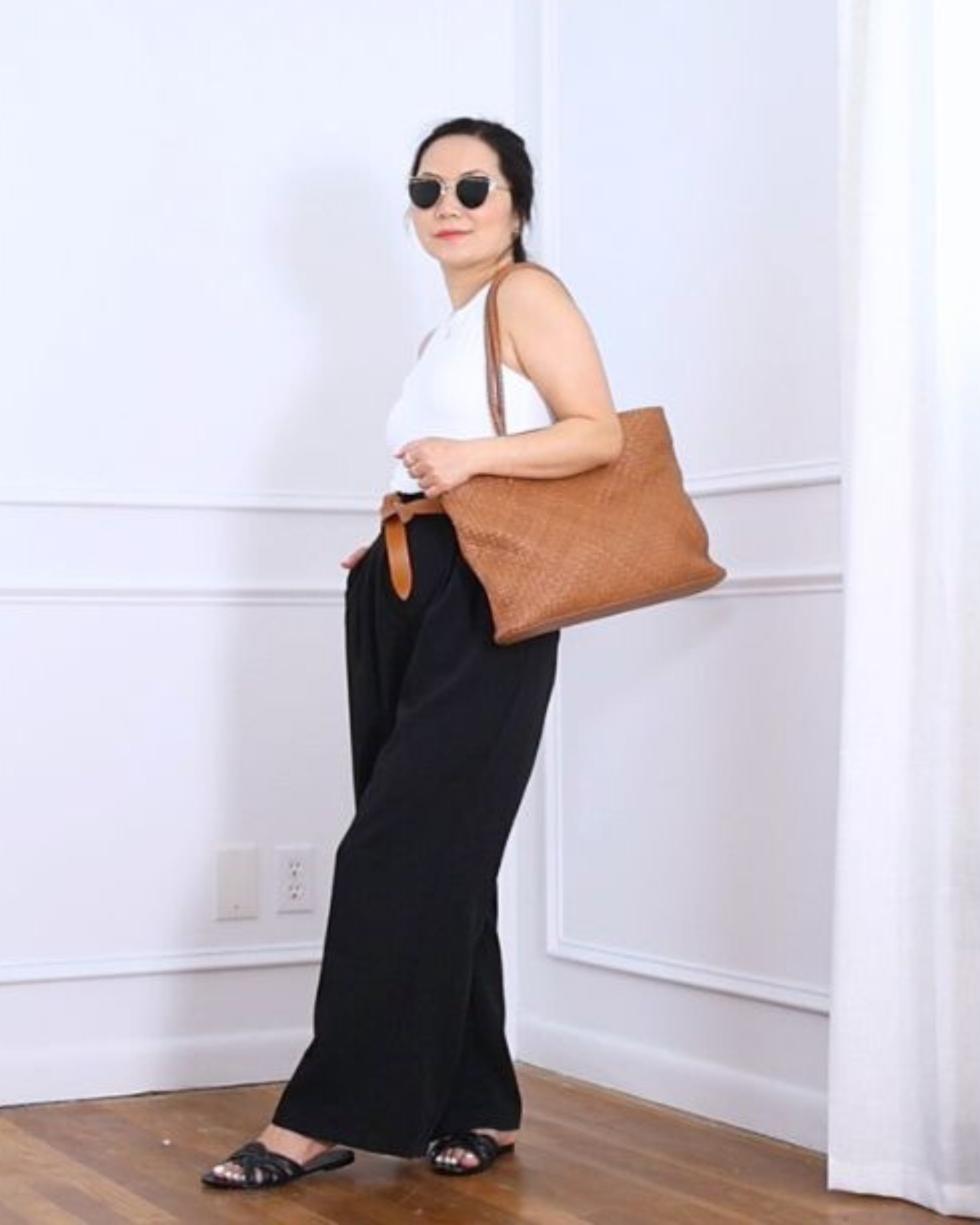 Wearing this high neck tank top from Klassy (size S) with wide-leg pants from Amazon (size S), a tote from Quince, and sandals from H&M. Such a comfy yet elevated look for petites like me (I’m 5’2”). Easy to dress up or down!

#LTKStyleTip #LTKPetite #LTKOver40