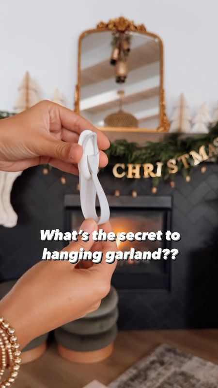 These command strip cord hooks are the best kept secret for hanging garland on your mantel this Christmas! 
Holiday decor
Christmas mantel
Mantle 
Garland 

#LTKVideo #LTKHoliday #LTKhome