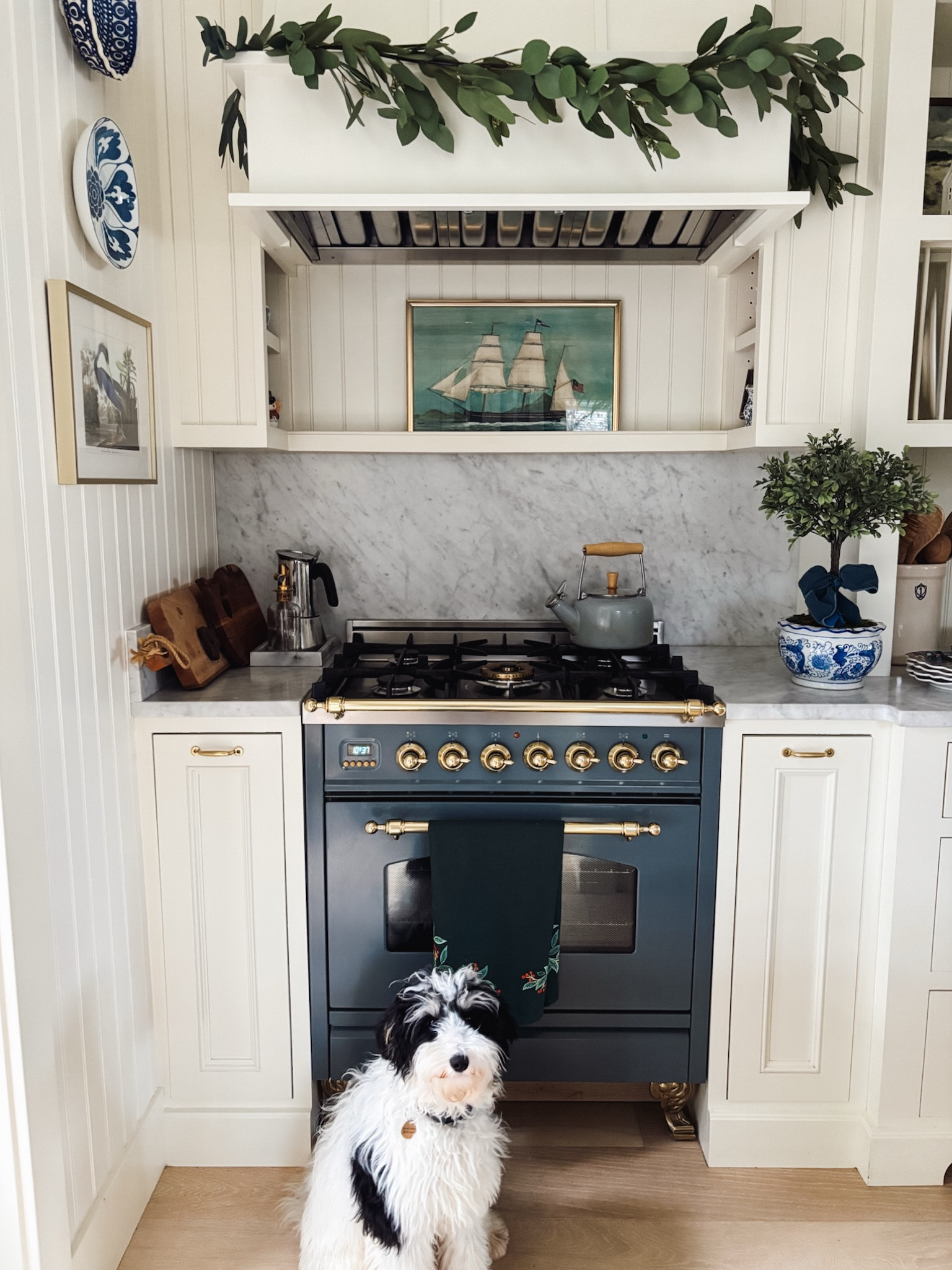 Kitchen stove, blue and white planter, eucalyptus garland, similar tea towel, art frames marble tray kettle 

#LTKHome #LTKSaleAlert #LTKHoliday