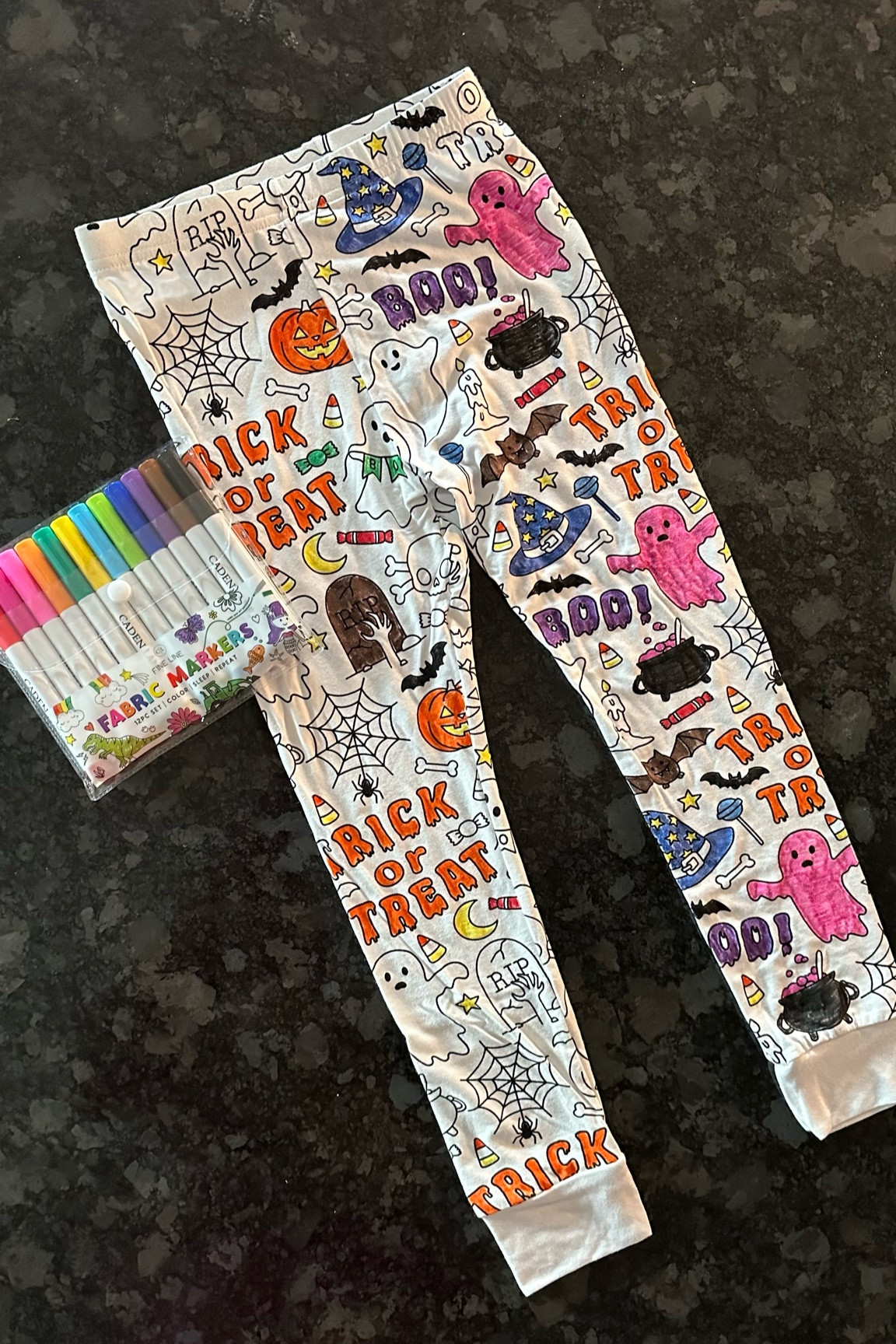 Color your own Halloween pajamas! Super fun activity for kids. Halloween finds. Halloween pajamas. 