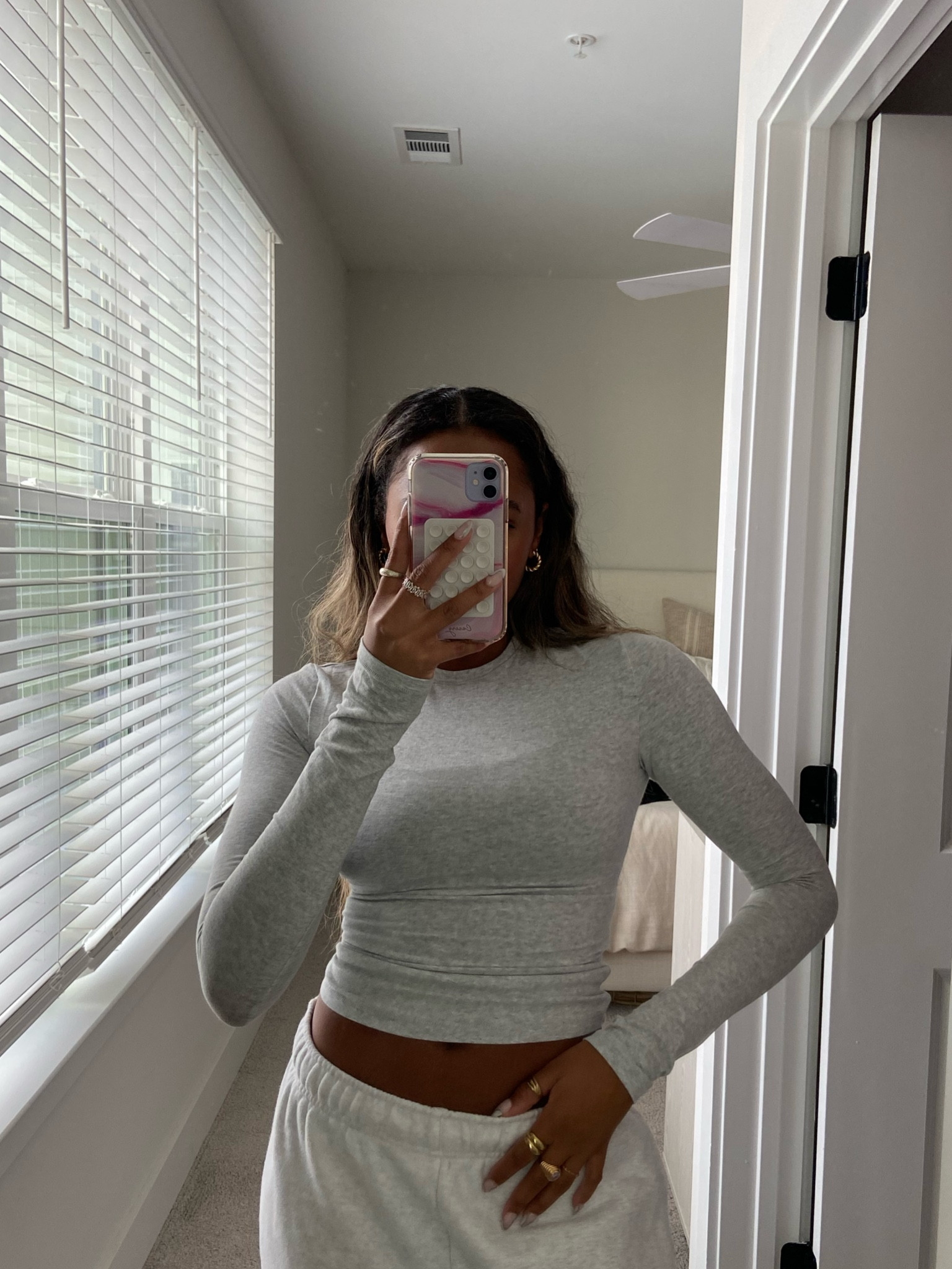 the perfect basic long sleeve whether you need a concert outfit, a base layering piece, travel outfit, etc this is perfect for all the fall outfits. 🤍 SKIMS SIZE XS 
size up for less of a compressed, more full coverage look. 

#LTKFind #LTKunder100 #LTKtravel