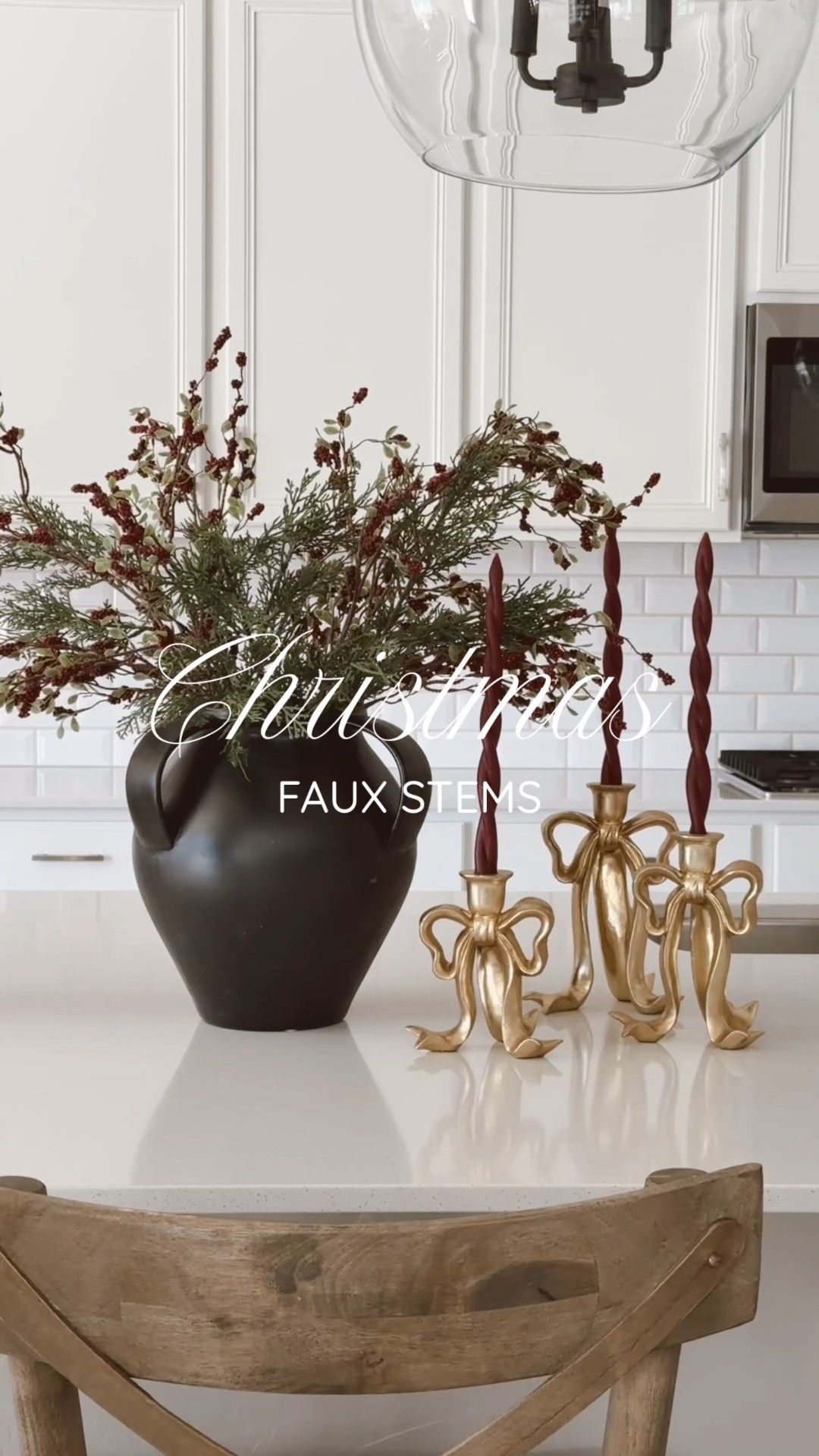 Just found the most beautiful faux Christmas stems and I’m obsessed!! 🤎They look so realistic and add that perfect lux holiday vibe. I also linked the gorgeous bow candle holder, vase, and candles because they complete the look! #christmas #christmasdecor #christmaskitchen #christmasfind #christmasbow #christmas2025 - Burgundy Christmas - Christmas Bow Candle Holder - Red Candles - Black Vase - Christmas Decor Ideas #ltkchristmas 

#LTKSeasonal #LTKHome #LTKSaleAlert