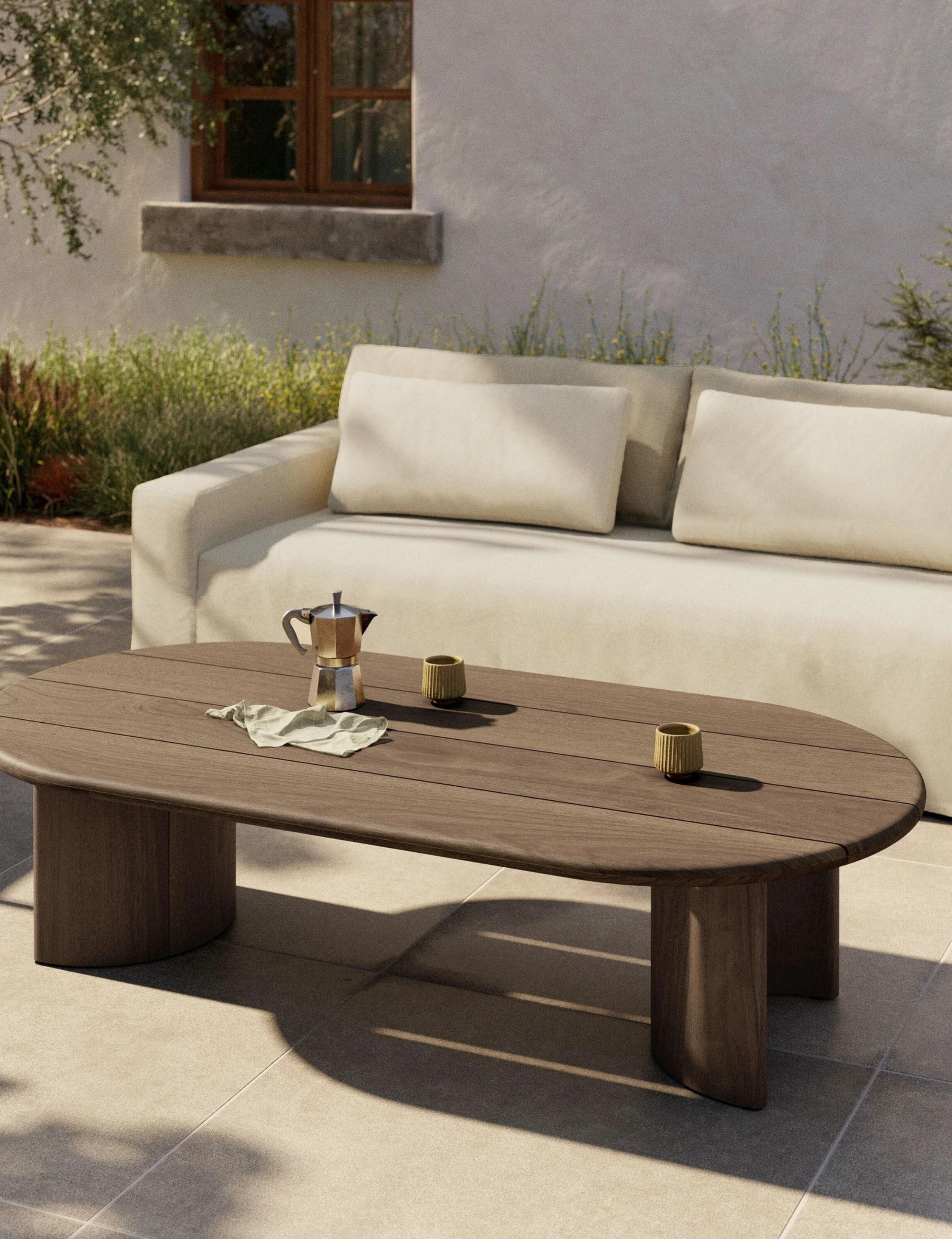 Gilda Outdoor Oval Coffee Table, Dark Brown | Lulu and Georgia 