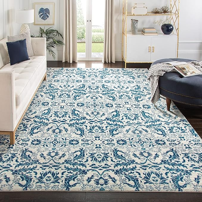 SAFAVIEH Evoke Collection Area Rug - 9' x 12', Ivory & Blue, Shabby Chic Oriental Design, Non-She... | Amazon (US)