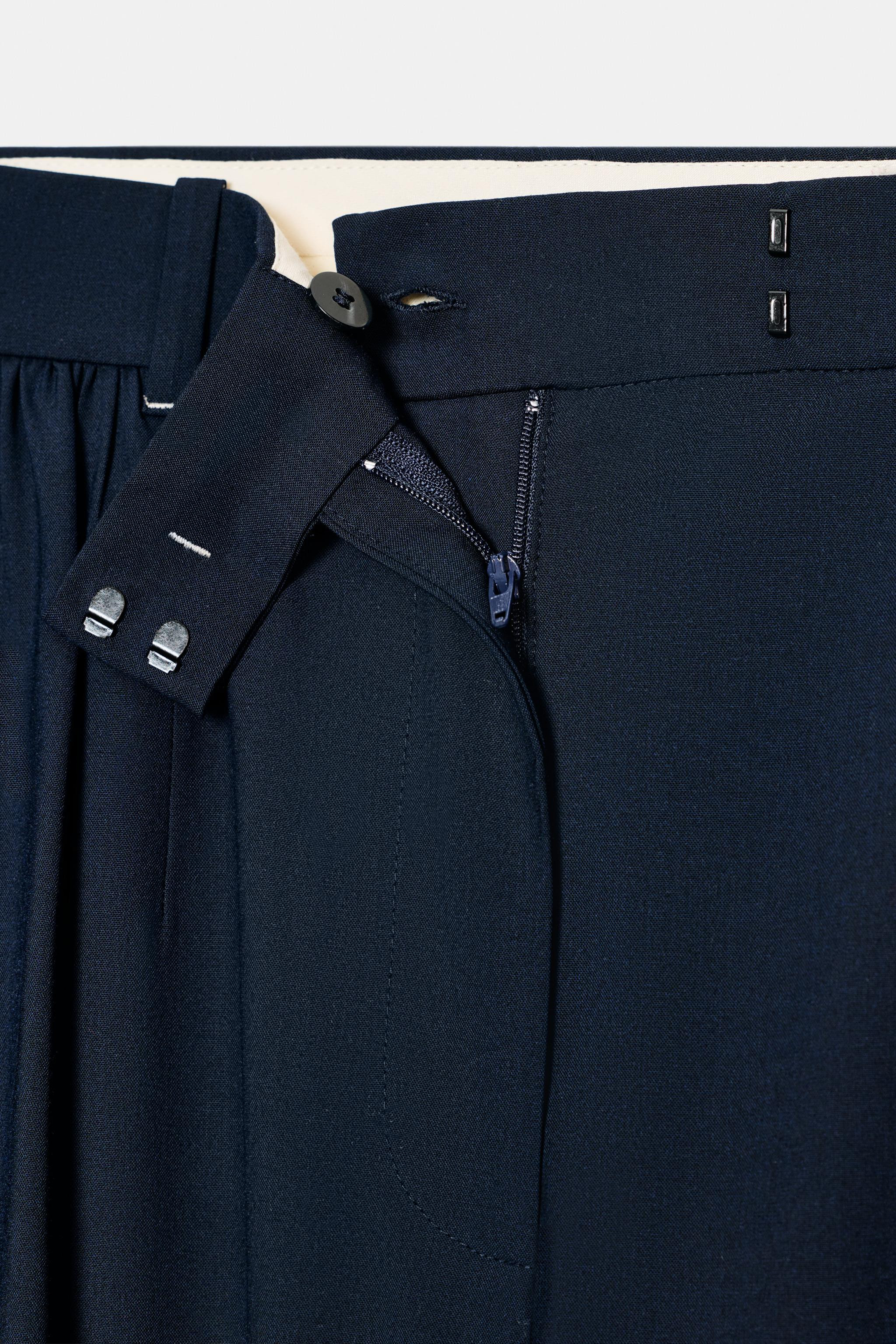 ZARA WOMAN COLLECTIONShirt made from a lyocell blend yarn. Round neck with self-fabric ties. Long... | Zara US