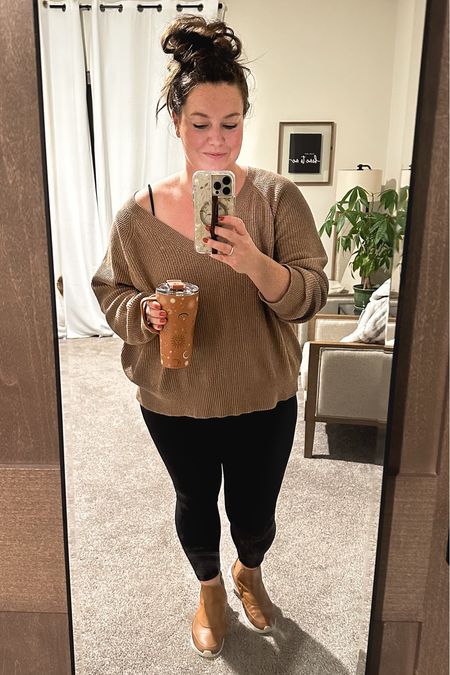 This top knot is my mood today. Running to drop a kid off at school because I could NOT motivate them to get ready in time for the bus. I can’t blame them, it was still pitch black outside. 

Sweater is 2 years old and I own it in three colors. 😂 Fave comfy butter soft aerie leggings (own in two colors and wish I had about four more pairs of!) and these killer sneaker boots linked. I get compliments on these shoes more than any other pair in my life. Eric picked them out, of course  Also, always linking my lazy bras because this is 35. 

Travel mug is the BEST, leakproof mug. This color is limited edition and sold out, BUT there’s a similar design still available from this collection. 

☀️🌙 

#LTKmidsize #LTKfindsunder50 #LTKfitness
