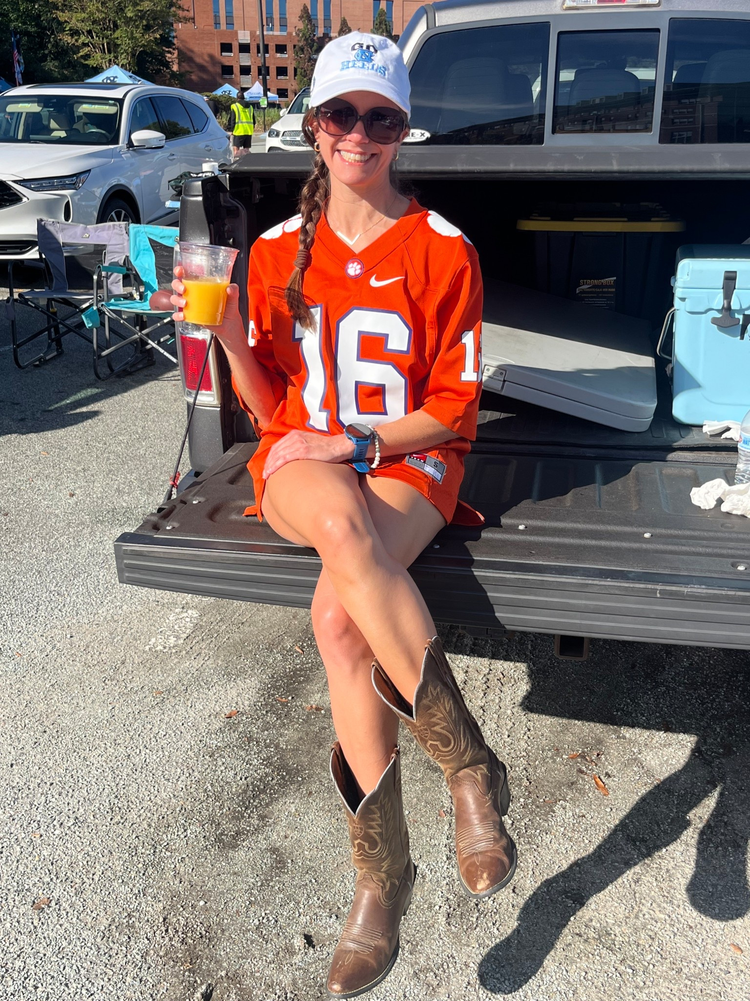 Game day fit for the UNC-Clemson football game! Featuring a Nike Jersey, my trusty Ariat cowgirl boots I’ve had for nearly 14 years, Kendra Scott huggie earrings, Tory Burch sunnies, Fahlo bracelet, and Garmin Forerunner watch! 

Gameday outfit, tailgate outfit, fall Saturdays, casual gameday outfit, Clemson gameday outfit 



#LTKSeasonal #LTKStyleTip