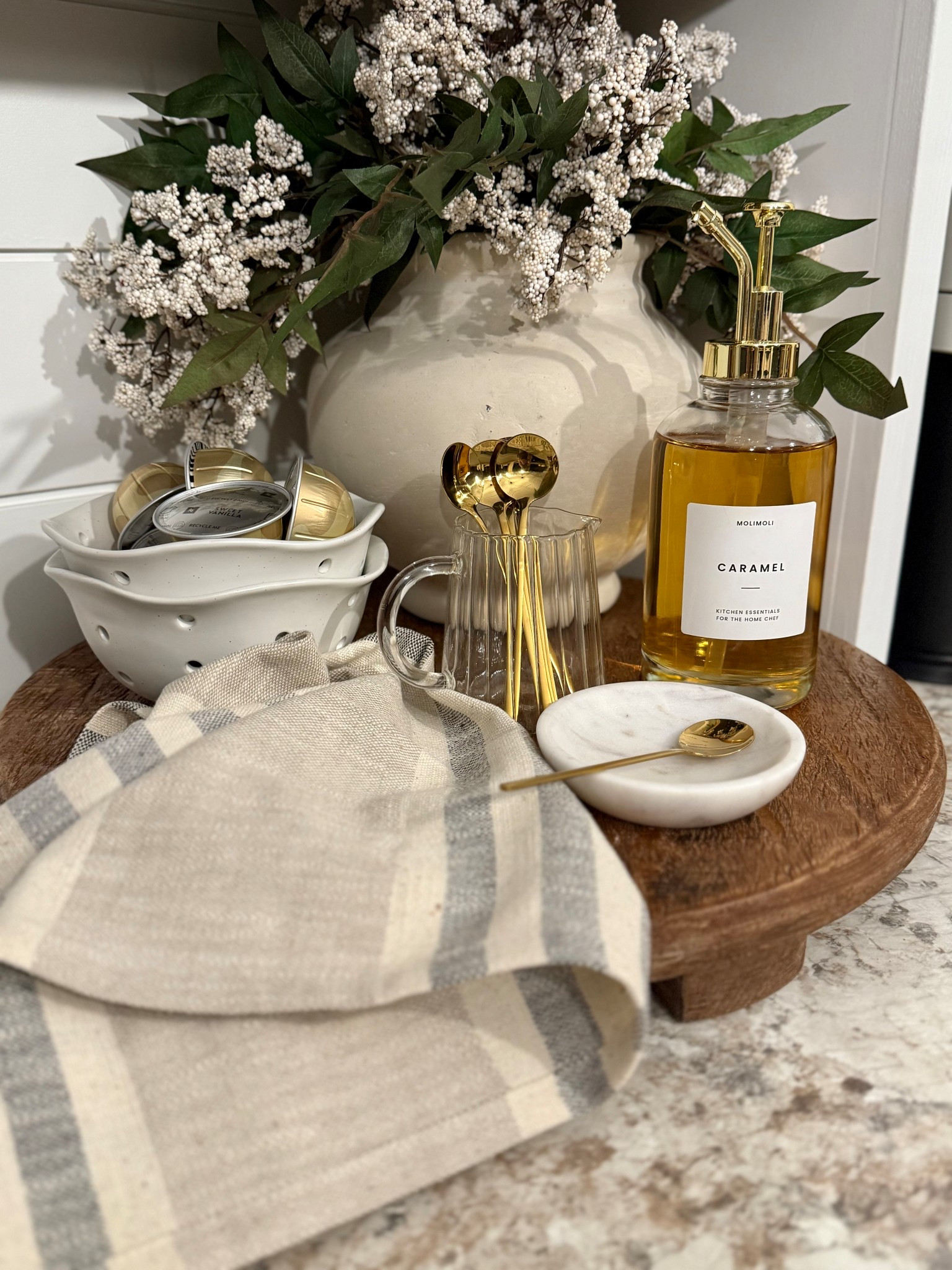 Coffee Corner Styling Ideas
Follow @farmtotablecreations on Instagram for daily home decor finds 🤍

This little coffee corner sits in our lower level bar area, and I love how warm and inviting it feels. Mixing wood tones, neutral ceramics, and a few brass accents keeps it functional for everyday coffee while still feeling elevated enough for entertaining. It’s the perfect spot for morning Nespresso runs or an after-dinner espresso when we’re hosting.

#bararea #coffeestation #coffeecorner #homebar #kitchendecor #countertopdecor #coffeebar #nespresso #homefinds #barstyling #homebarideas #barcounter #barcartstyle #barware #countertopstyling #neutraldecor #modernorganic #kitchenbar #coffeebarsetup #coffeevibes #espresso #coffeelovers #homeinspo #decorinspo #kitchenfinds #amazonhome #ltkhome #ltkfinds #homedetails

#LTKFindsUnder50 #LTKHome #LTKSaleAlert