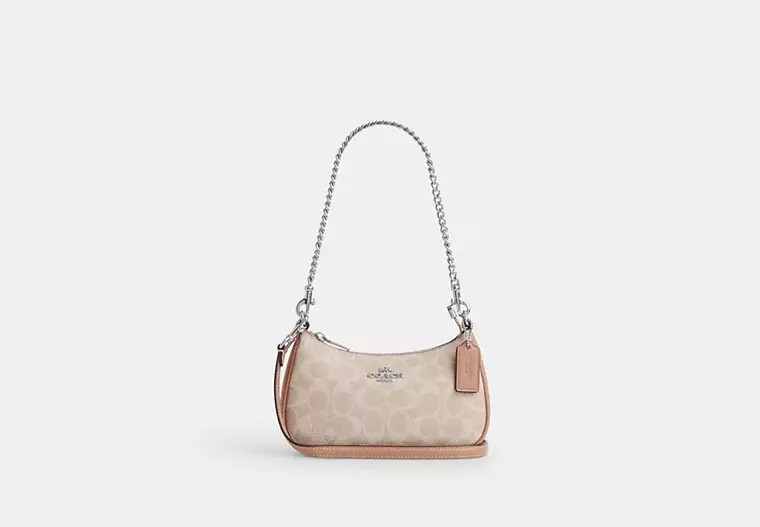Coach Outlet Teri Crossbody Bag In Signature Canvas - Beige, Size: Mini | Coach Outlet US