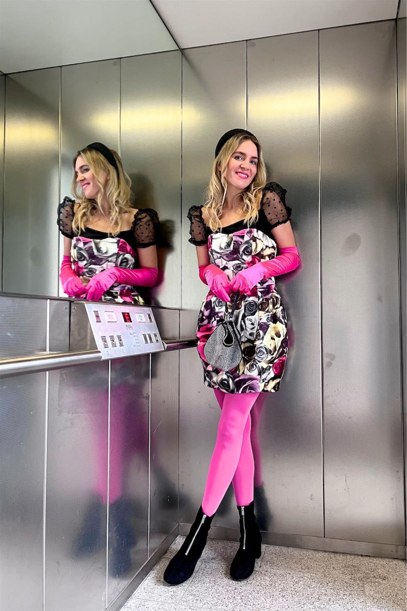 Happy Valentine’s Day. Fashion Blogger Girl by Style Blog Heartfelt Hunt. Girl with blond hair showing her Valentine’s Day look wearing a puff sleeve blouse, floral dress, padded headband, pink long opera gloves, pink colorful tights, rhinestone bag and sock boots. #colorfuloutfit #colorfulstyle #colorfulfashion #colorfullooks #fashionfun #cutefalloutfit #fallfashion2022 #falllookbook #fitcheck #dailylooks #dailylookbook #contentcreator #microinfluencer #discoverunder20k #vday #valentinesday #vdaylook #valentinesdaylook #vdayinspo #valentinesdayinspo