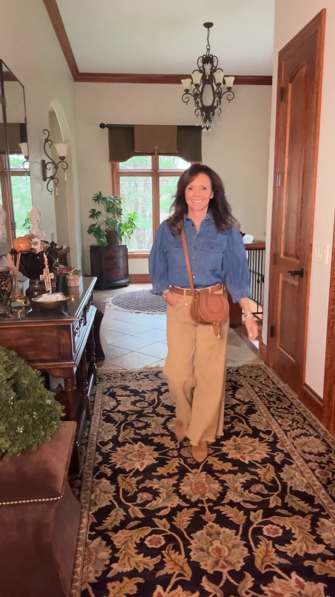 Denim button down shirt with puff sleeves
Embroidered wide leg pants
Suede boots
Brown leather crossbody purse
Brown reversible belt 

#LTKPetite #LTKShoeCrush #LTKOver40