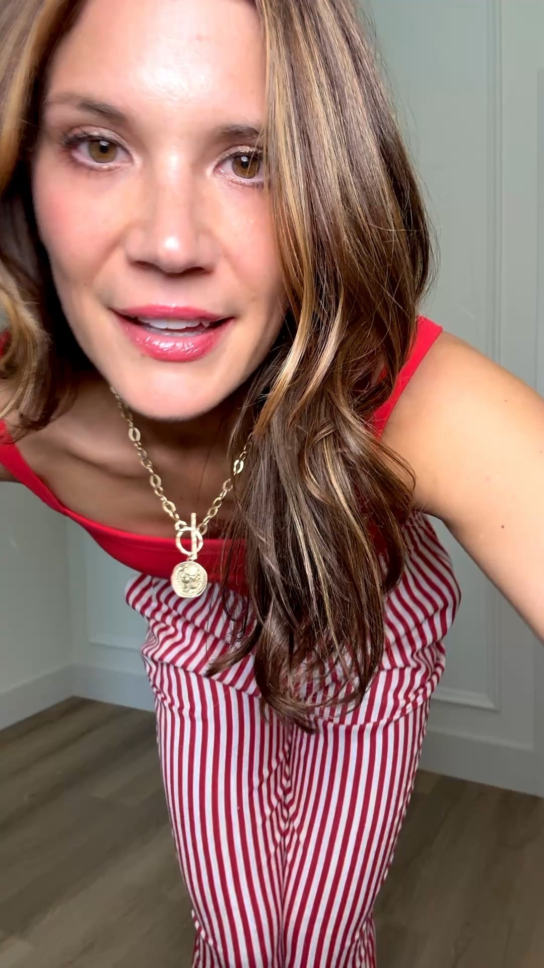 This red and white combo feels so classic for summer. The striped pants are lightweight and comfy, but still make the outfit look pulled together, and this red tank is one of those basics that instantly makes everything look better.

Red and white outfit, striped pants outfit, summer outfit idea, casual summer style, coastal summer fashion, patriotic outfit idea, comfy vacation outfit, easy everyday outfit, lightweight summer pants, red tank top outfit, resort casual style, tall girl friendly pants, Stang and Co

#LTKSeasonal #LTKTall #LTKootd