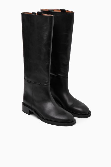 Knee-high boots 
Horse black boots 

#LTKSeasonal #LTKHoliday #LTKshoecrush