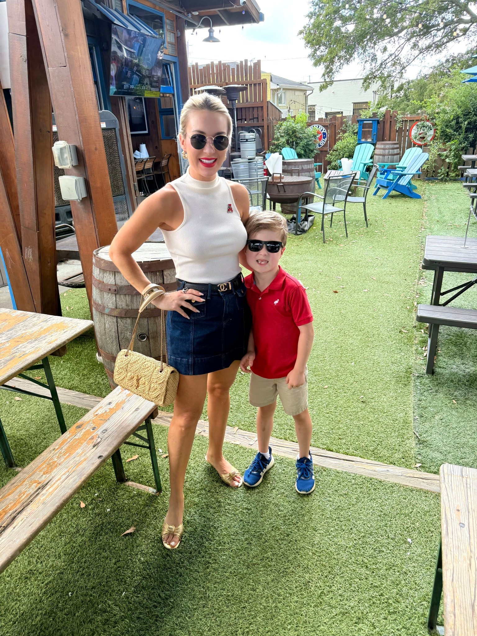 Fall football outfit. Wearing size small in top & size 26 in denim skirt.  Reynolds is wearing size 7 in red polo & size 6 in shorts  

#denimskirt #fallfit #falloutfit #fallskirt #denimlook #falltransition 

#LTKSeasonal #LTKStyleTip #LTKOver40