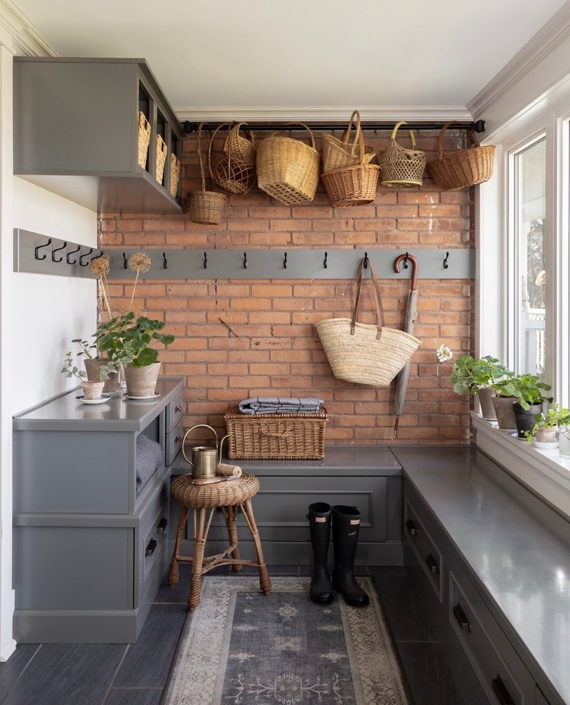 Traditional English country-style mudroom with hanging baskets.🧺 

#LTKHome #LTKSeasonal #LTKOver40