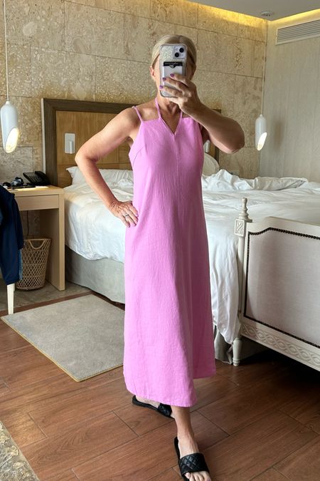 I’m loving this cute pink linen dress from Target! The halter tie detail at the neck and lightweight, lined fabric make it a perfect summer staple!

#LTKSeasonal #LTKSaleAlert #LTKOver40