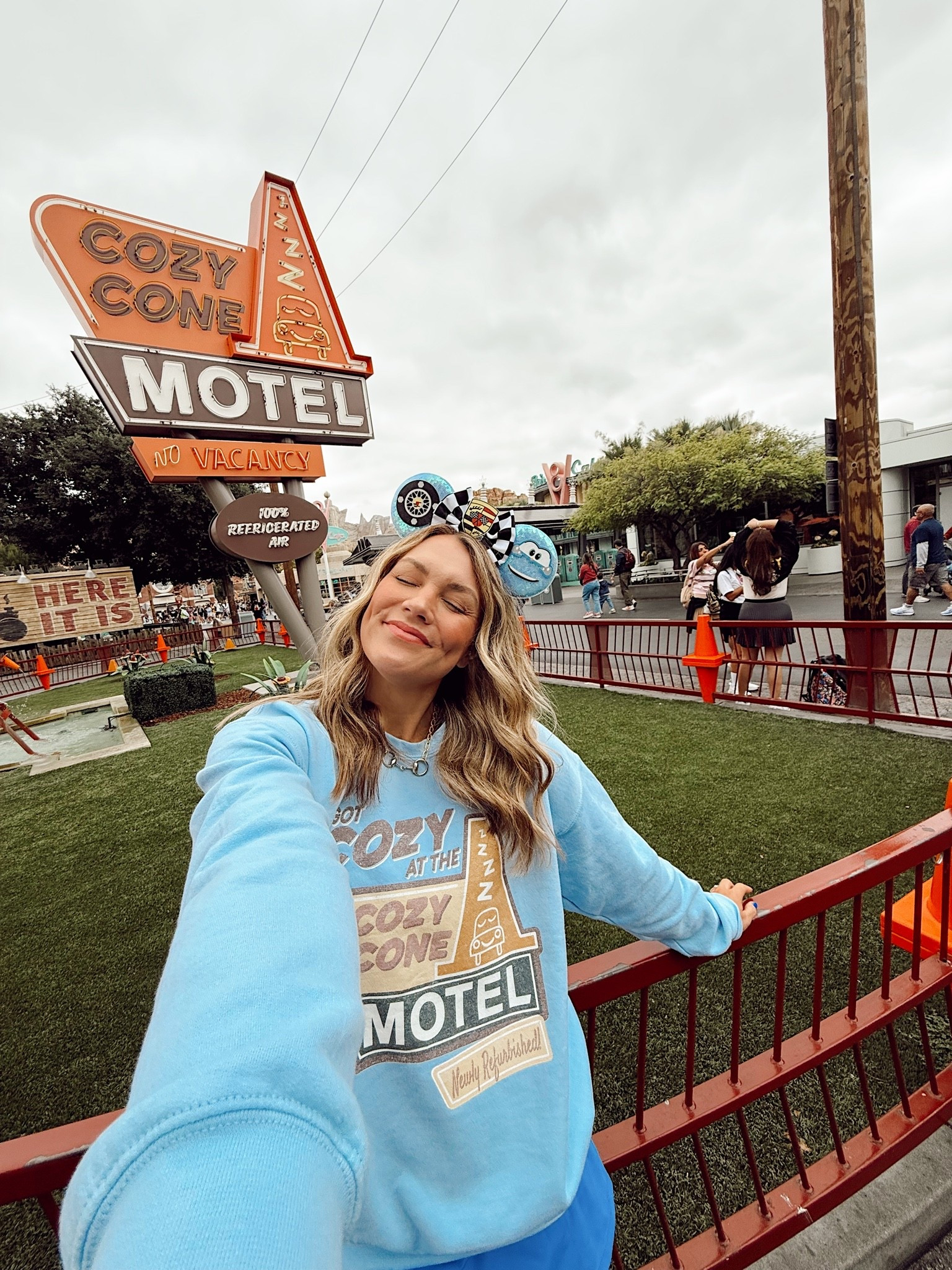 The cutest little town in carburetor county! 

My Sally Carrera Minnie ears and cozy cone sweatshirt are from Etsy! Athletic dress is a Walmart find and has hidden shorts so you can pee 😂👏