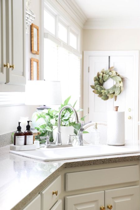 My corner kitchen sink has a great space behind it where plants receive a lot of natural light. I have a lamp there also to keep the space bright in the evenings.

#LTKhome