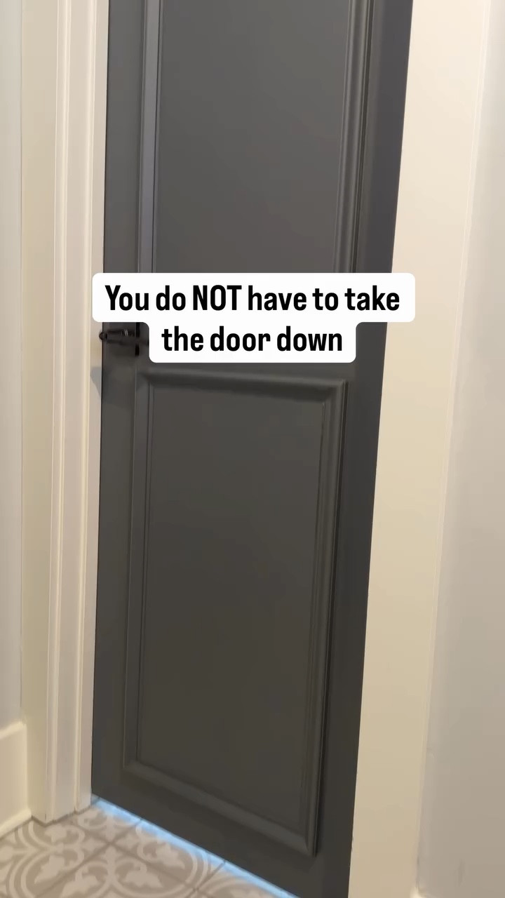 How to do this $40 DIY door upgrade without taking the door down 👇

A lot of you asked if this would work on a door still on the hinges, so I tested it. It does — and here’s the full process I used:

1. Measure the flat recessed panels you want to cover on the existing door. 
  You want the hardboard insert sized to fit those center areas cleanly.

2. Cut hardboard/MDF panels to those measurements. 
  You can cut them yourself or have the store cut them for you.

3. Cut picture frame molding for the trim border around each panel. 
  Use a miter saw or even a simple miter box if that’s what you have.

4. Assemble each new panel first off the door so you’re not trying to build it vertically. 
  I attached the molding to the hardboard panel using instant bond glue + activator to make assembly faster and easier.

5. Prime everything. 
  I primed the assembled panels before installing them so I wasn’t trying to get full coverage after they were already attached.

6. Caulk the seams/gaps on the assembled panels for a cleaner finished look. 
  This step makes a huge difference once painted.

7. De-gloss / prep the door surface before attaching anything. 
  You want the existing door finish cleaned and scuffed so the new panel adheres better.

8. Use the same instant bond glue + activator on the door to attach the finished panels while the door is still hanging. 
  That was the part everyone asked about — and yes, this is how I made it work without removing the door.

9. Press panels into place carefully and check alignment with level before fully committing. 
  Since the door is vertical, you want to be intentional here.

10. Final caulk + paint touchups once installed so it looks seamless and built in.

That’s it. Same upgrade, same look — just adapted for a door that stayed up the whole time.

Save this for when you’re ready to make a builder-grade door look custom.

#buildergradeupgrade #diydoorupgrade #interiordiy #homediyprojects #budgetfriendlydiy