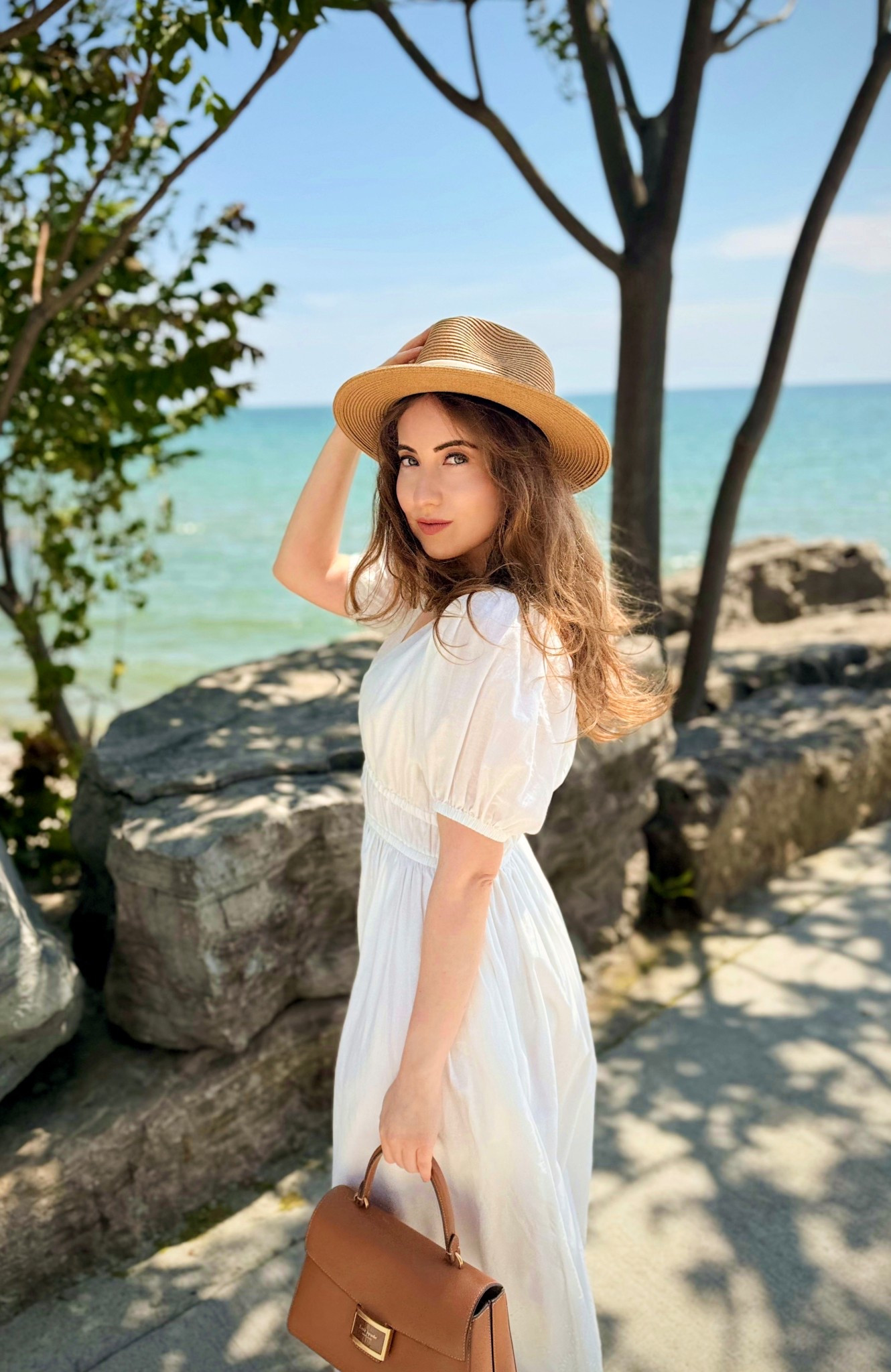 White cotton dress. Straw hat. Classic summer Mediterranean look. 

#LTKstyletip #LTKcanada #LTKsummer