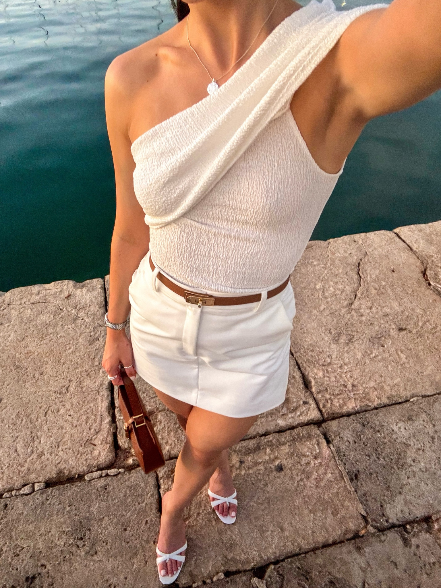 Holiday outfit, white outfit, white skirt, textured top, brown bag, Mango, Charles and Keith, Mallorca outfit, holiday inspo, summer outfit 

#LTKsummer #LTKstyletip #LTKeurope