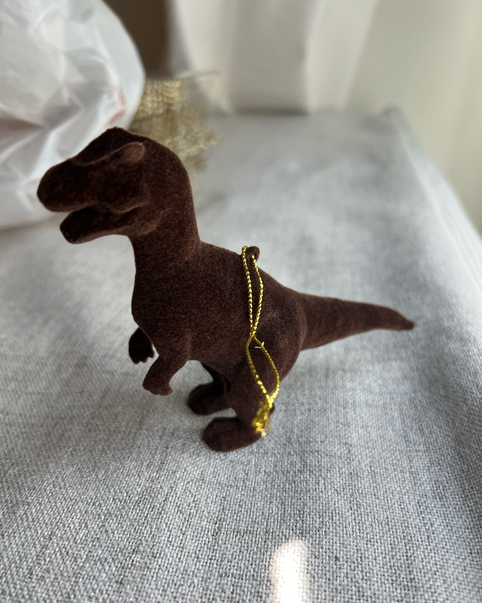 Flocked T Rex Christmas tree ornament- brown. Target Christmas tree ornaments for kids. $3.00. 

#LTKSeasonal #LTKKids #LTKHoliday