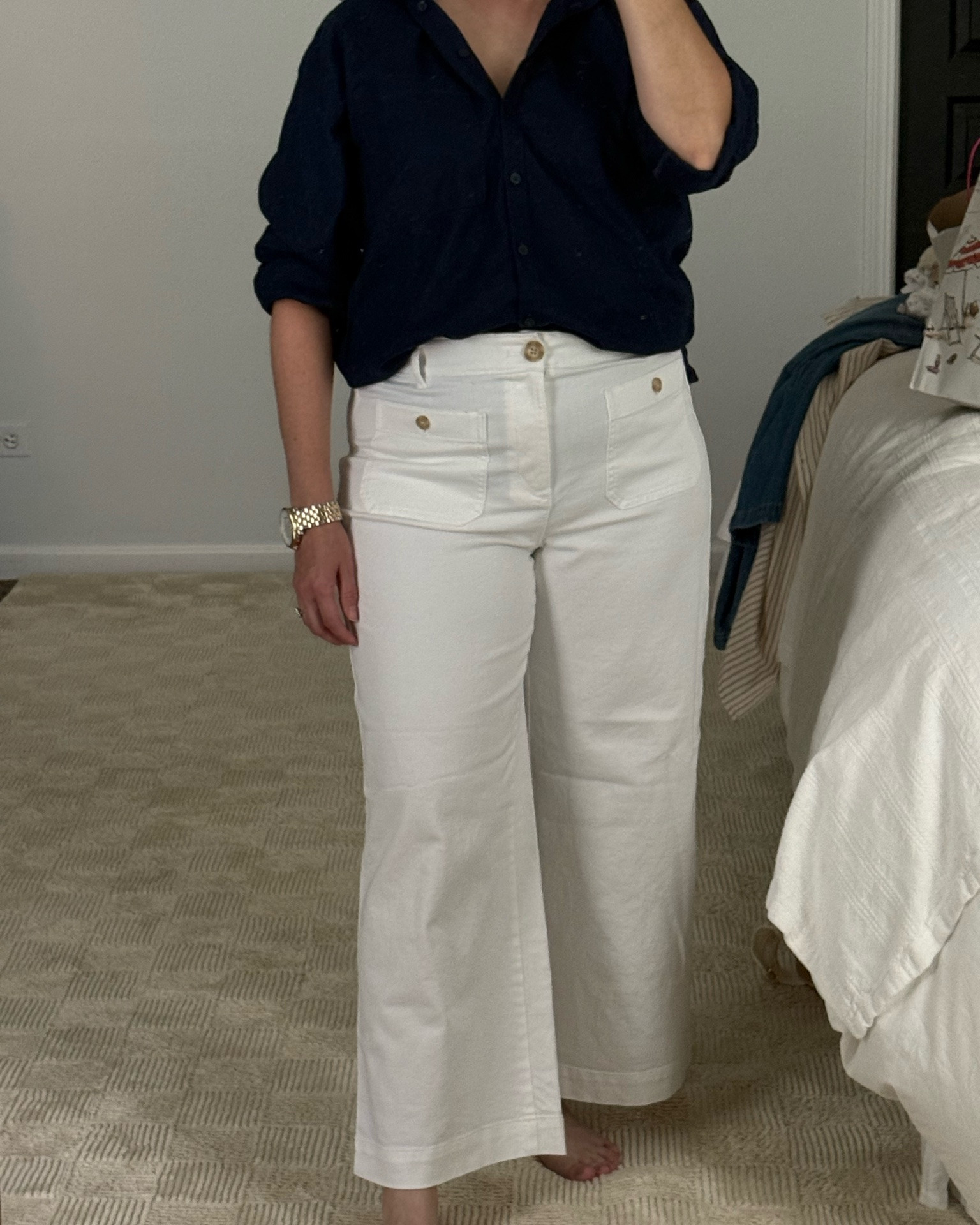 Doing a try on of cloths I bought recently. Loft is having a huge sale 55% off plus an extra 15% off. I picked up this navy button down linen shirts and white pants that I think are gonna be a summer staple. Just a very classic, casual look that can easily be dressed up with jewelry and heels. These pants are cropped and I like where they hit on me. They are a regular length, I am 5’2”.￼ Although you can see my shirt tucked in the front, they’re really not super see-through pants. ￼

#LTKSaleAlert #LTKPetite #LTKOver40