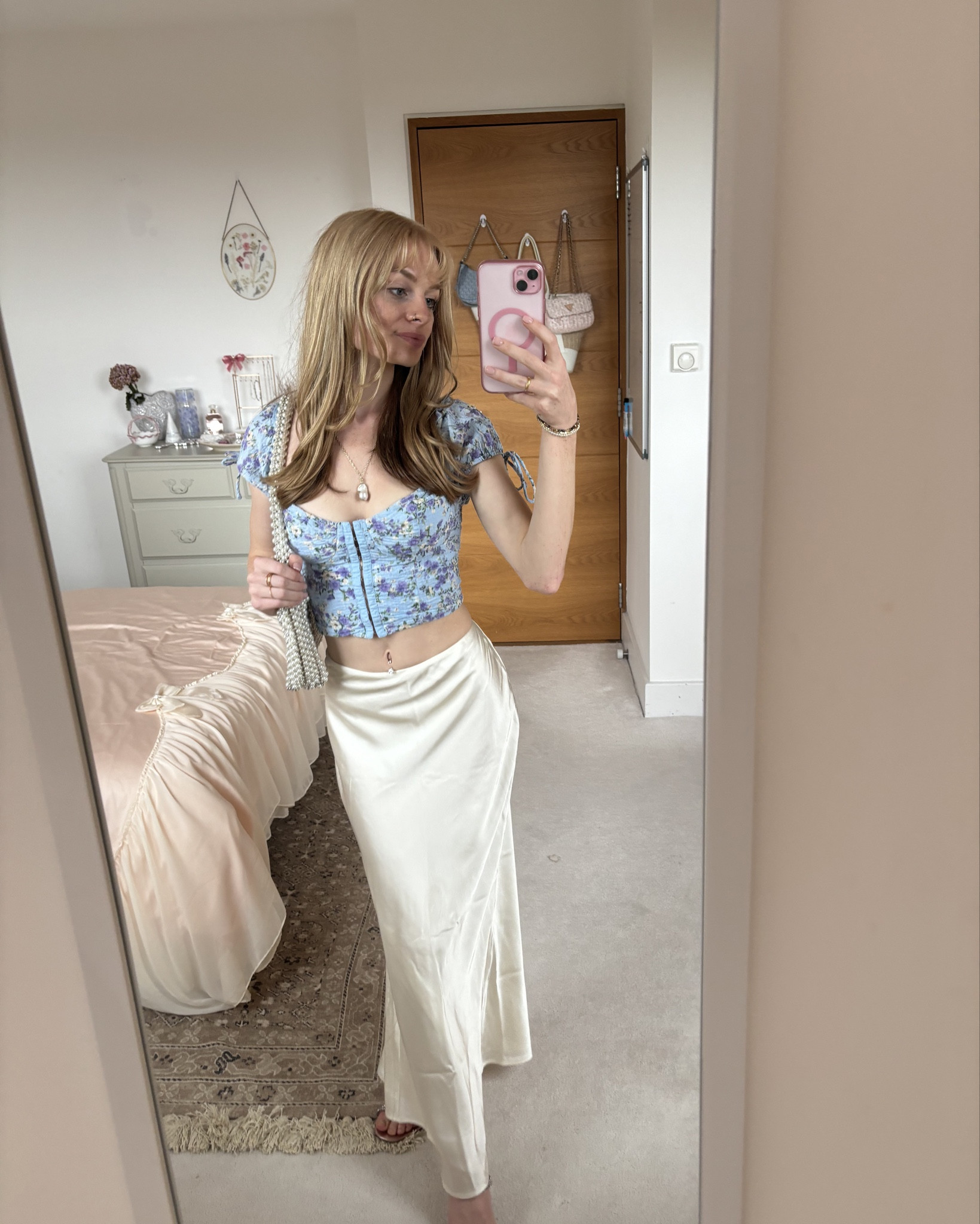 H&M skirt, Urban Outfitters top (linked similar as it’s out of stock) & a pearl structured bag 🤍

#LTKuk #LTKsummer #LTKeurope